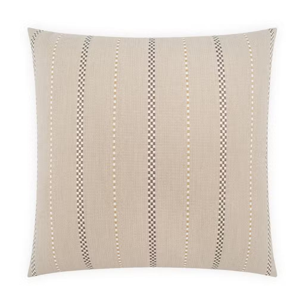 Checkered Stripe Outdoor Pillow featuring a square beige design with textured fabric and evenly spaced vertical stripes in black, gray, and white. Filled with a deluxe angel hair 22″ x 22″ pillow insert for enhanced comfort and support.