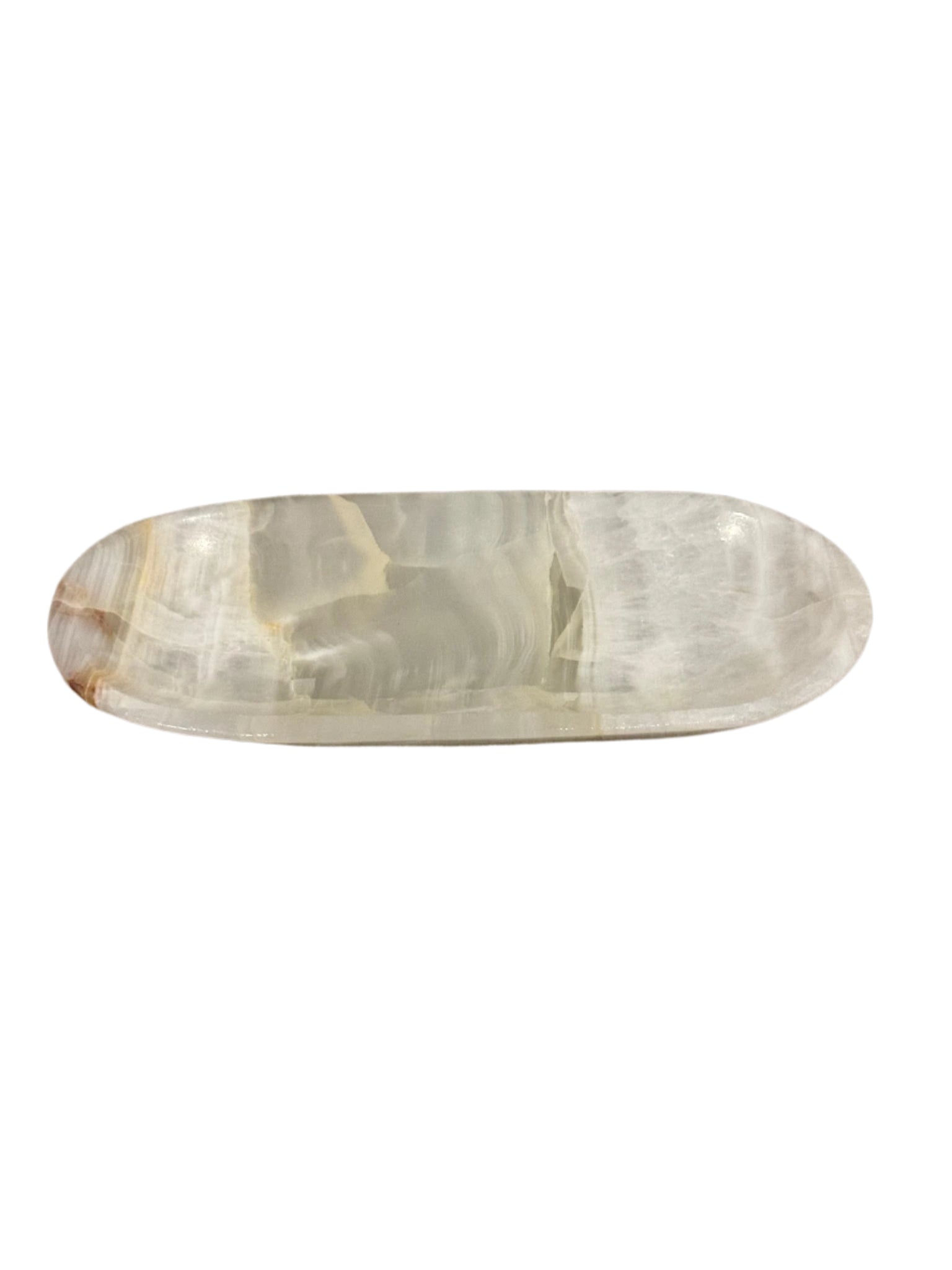 The Small Oval Onyx Tray features polished onyx with subtle beige and gray veining, bringing a touch of sophistication to any space. Its smooth, oval shape makes it an elegant décor piece. Shown on a white background.