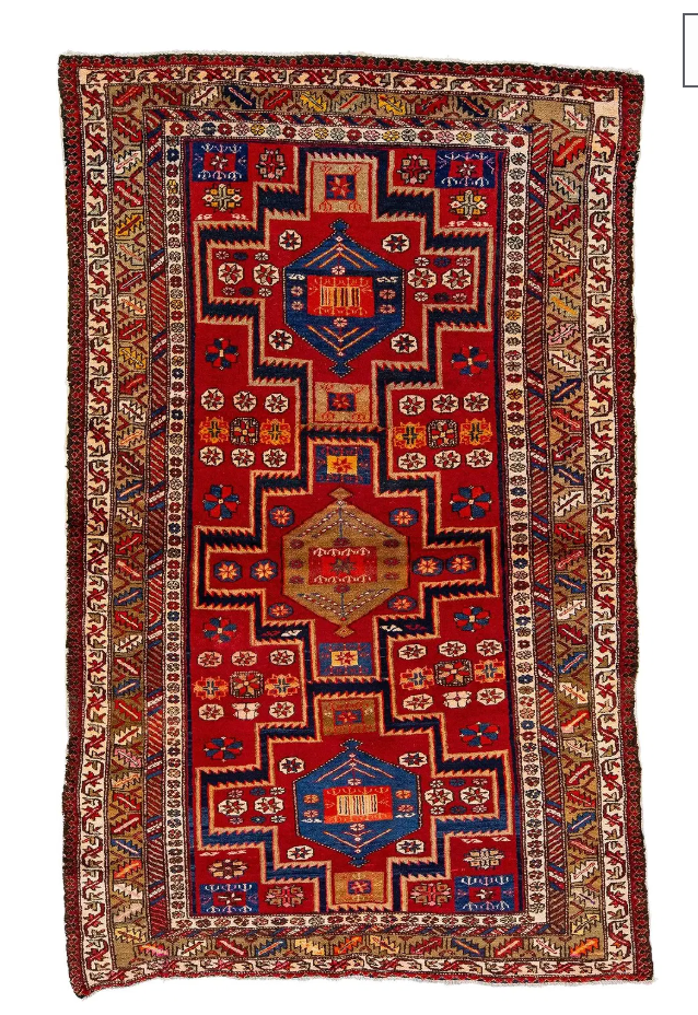 The 1960s Handmade Persian Kazak Wool Rug features a rectangular shape, red background, geometric patterns, intricate blue, white, yellow, and brown borders, central medallions, and classic decorative motifs.