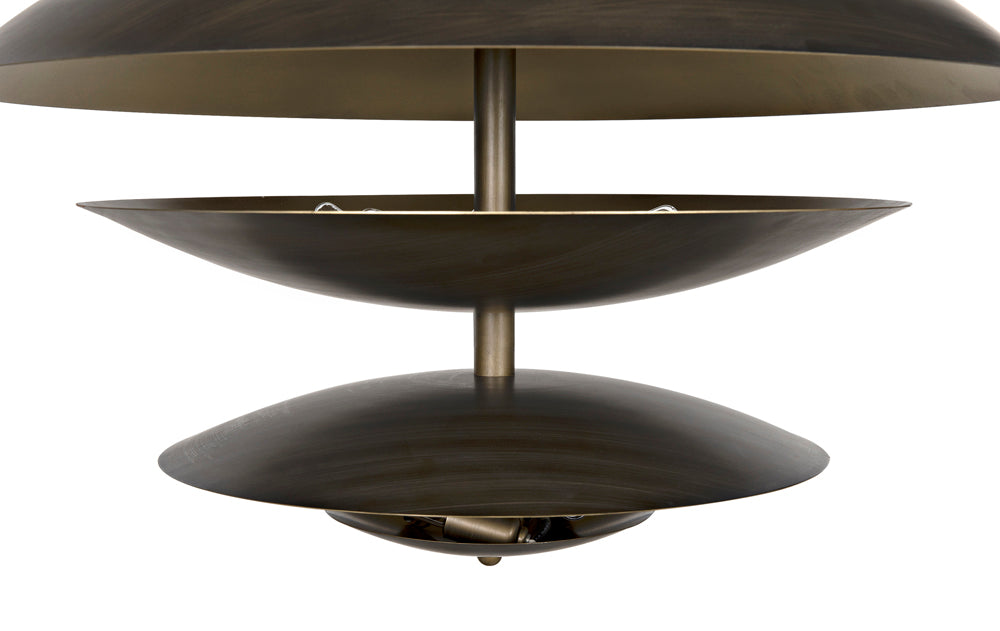 A close-up view of the Chandelier Two Tiered Metal with Aged Brass Finish, showcasing its modern design with large, round shades stacked vertically around a central rod.