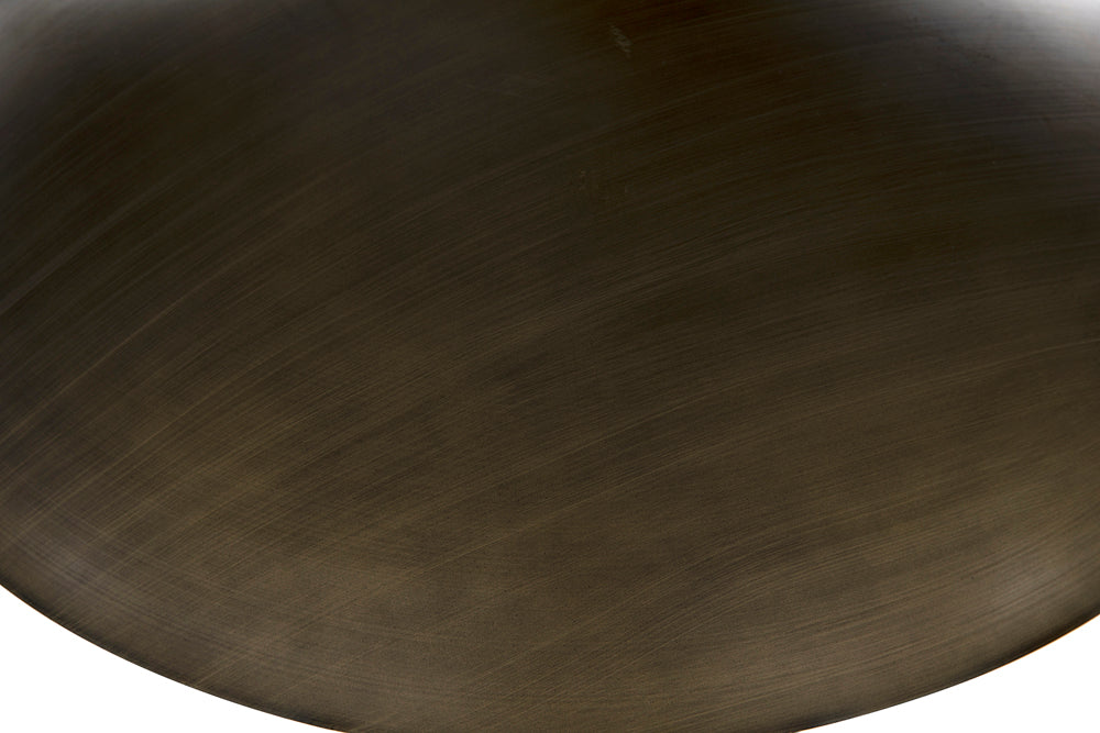 Close-up of a two-tiered metal chandelier with an aged brass finish, highlighting its smooth texture and subtle curved lines—an artisan detail ideal for modern interiors.