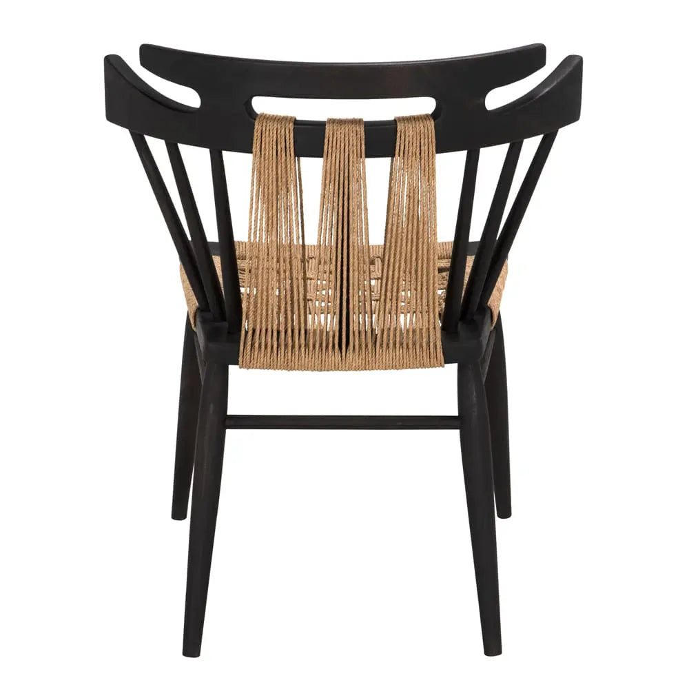 The Black Wood & Woven Chair features a black wooden frame with a woven tan rope seat and backrest, vertical rope strands, a curved backrest, and measures 24W x 20D x 32H. The chair is shown from behind.