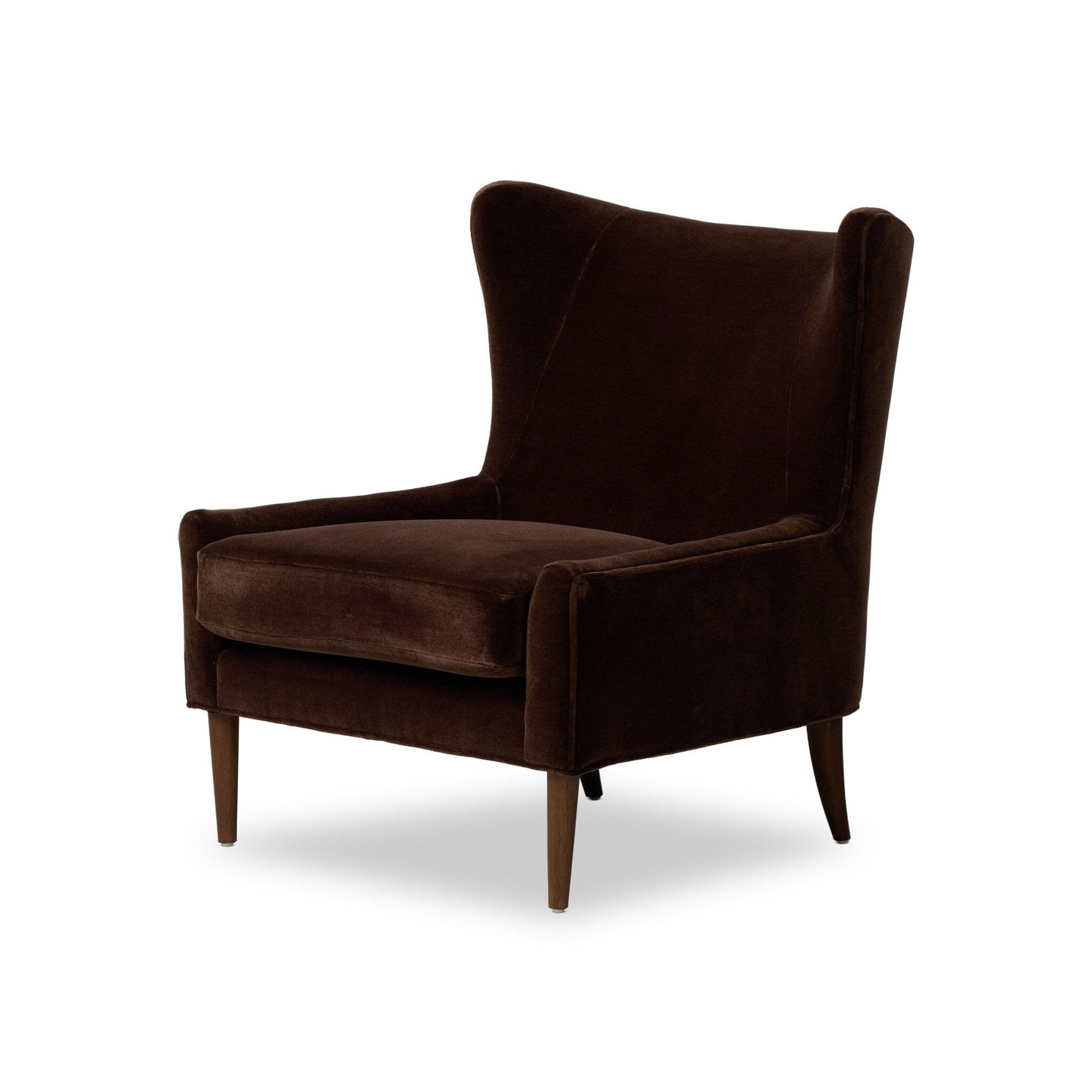 The Marlow Wing Chair, upholstered in dark brown velvet with wooden legs and classic wingback design, is angled slightly left against a white background, showcasing its elegant profile and refined dimensions.