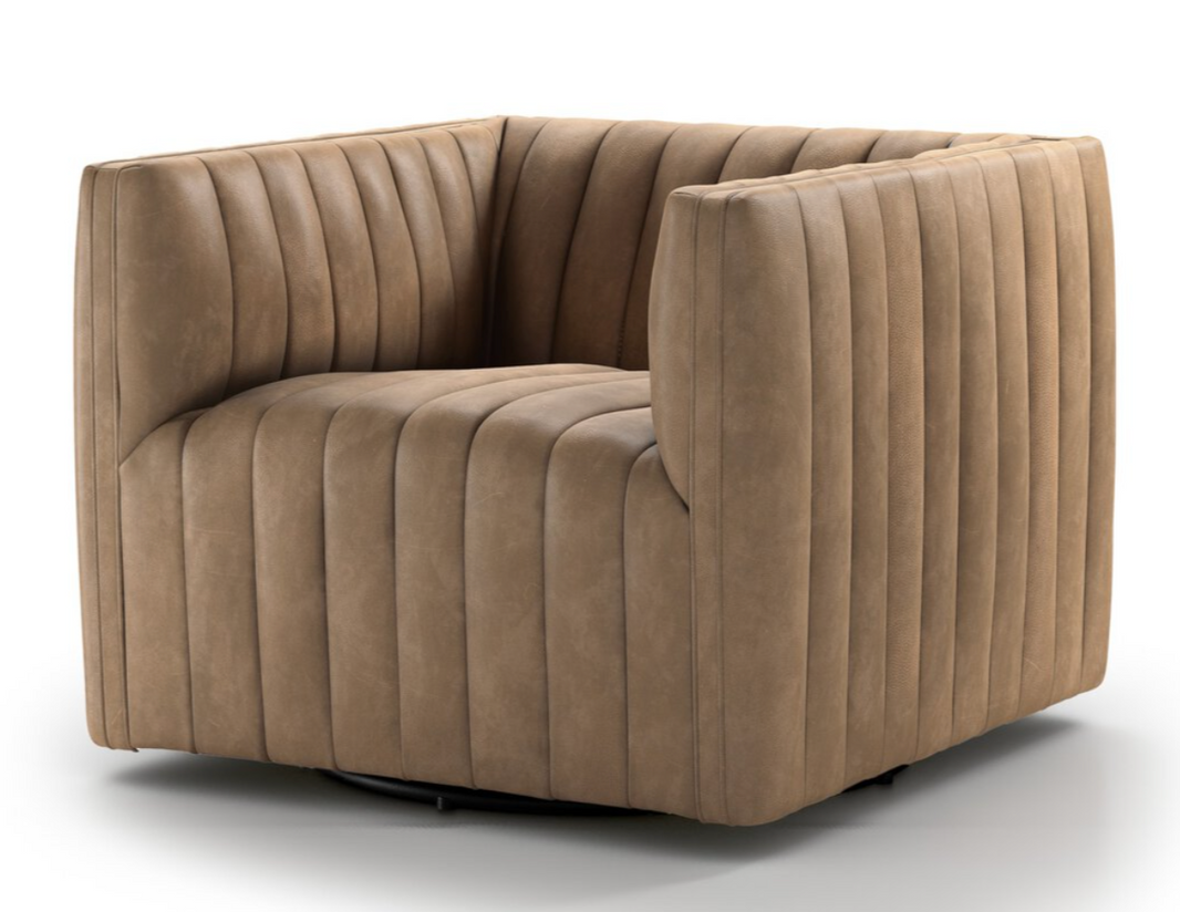 The Augustine Swivel Chair is a modern 33-inch wide piece with light brown leather, vertical channel tufting, padded sides and backrest, plus a concealed swivel base—perfect as a standout in any living room.