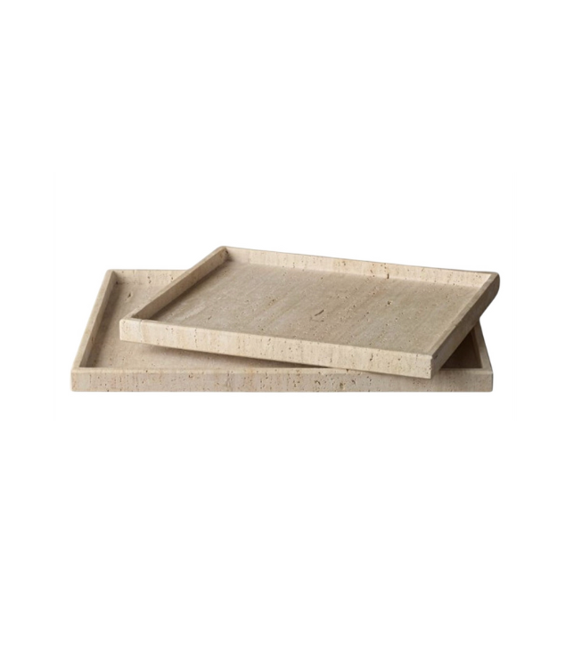 Two rectangular Large Travertine Trays in cream color, one slightly smaller and stacked diagonally atop the other, crafted from natural stone and displayed on a plain white background.