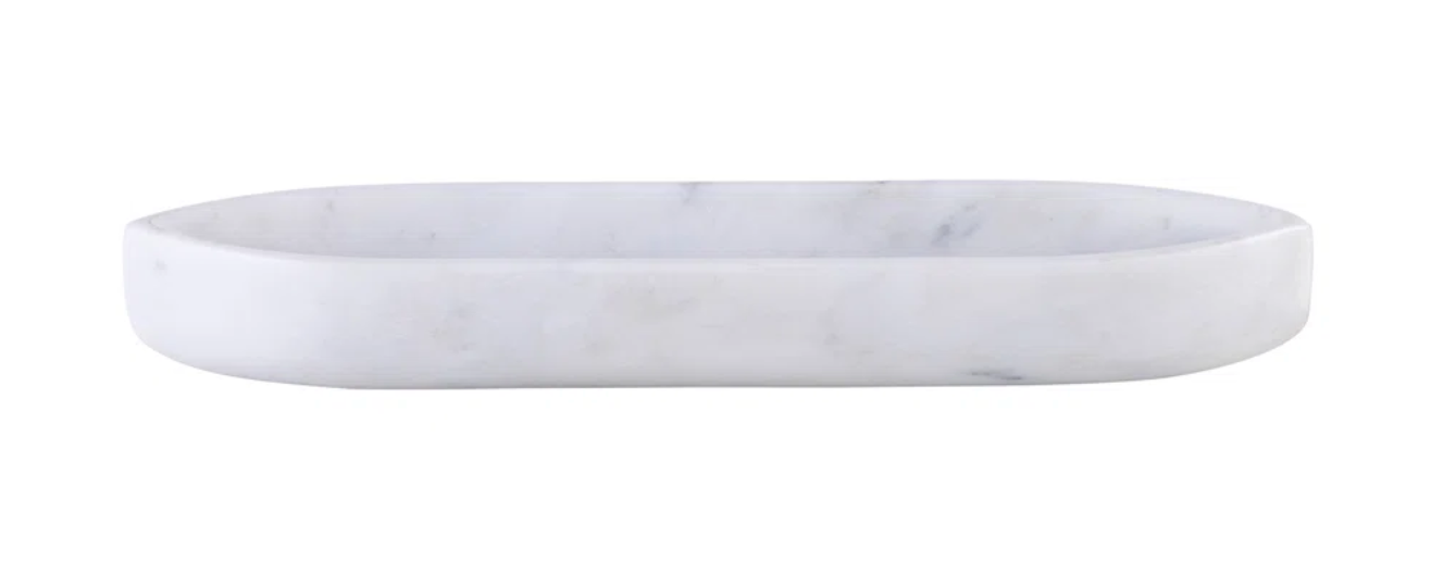 The Marble Boat Shape Platter features a white oval design with smooth edges, resembling a boat, and is displayed against a plain white background.