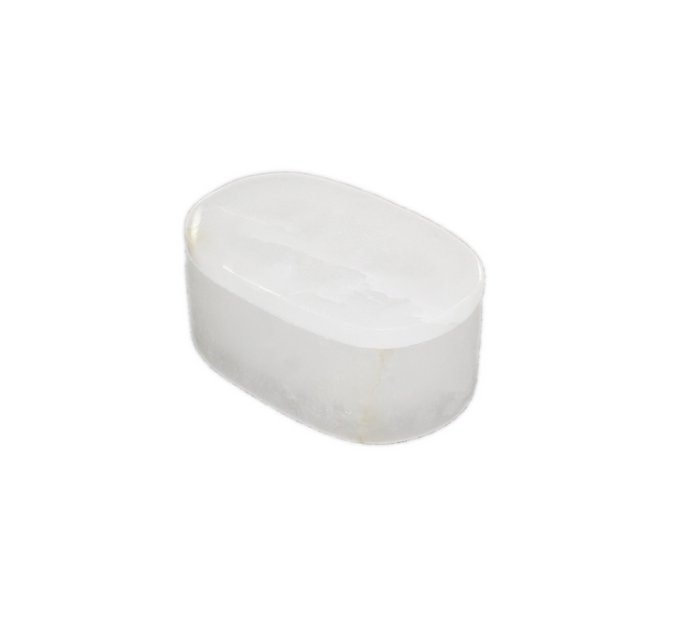 A single, smooth, white Small White Alabaster Oval Box rests on a plain white background—perfect for display in an elegant storage container or decorative box as a subtle accent piece.
