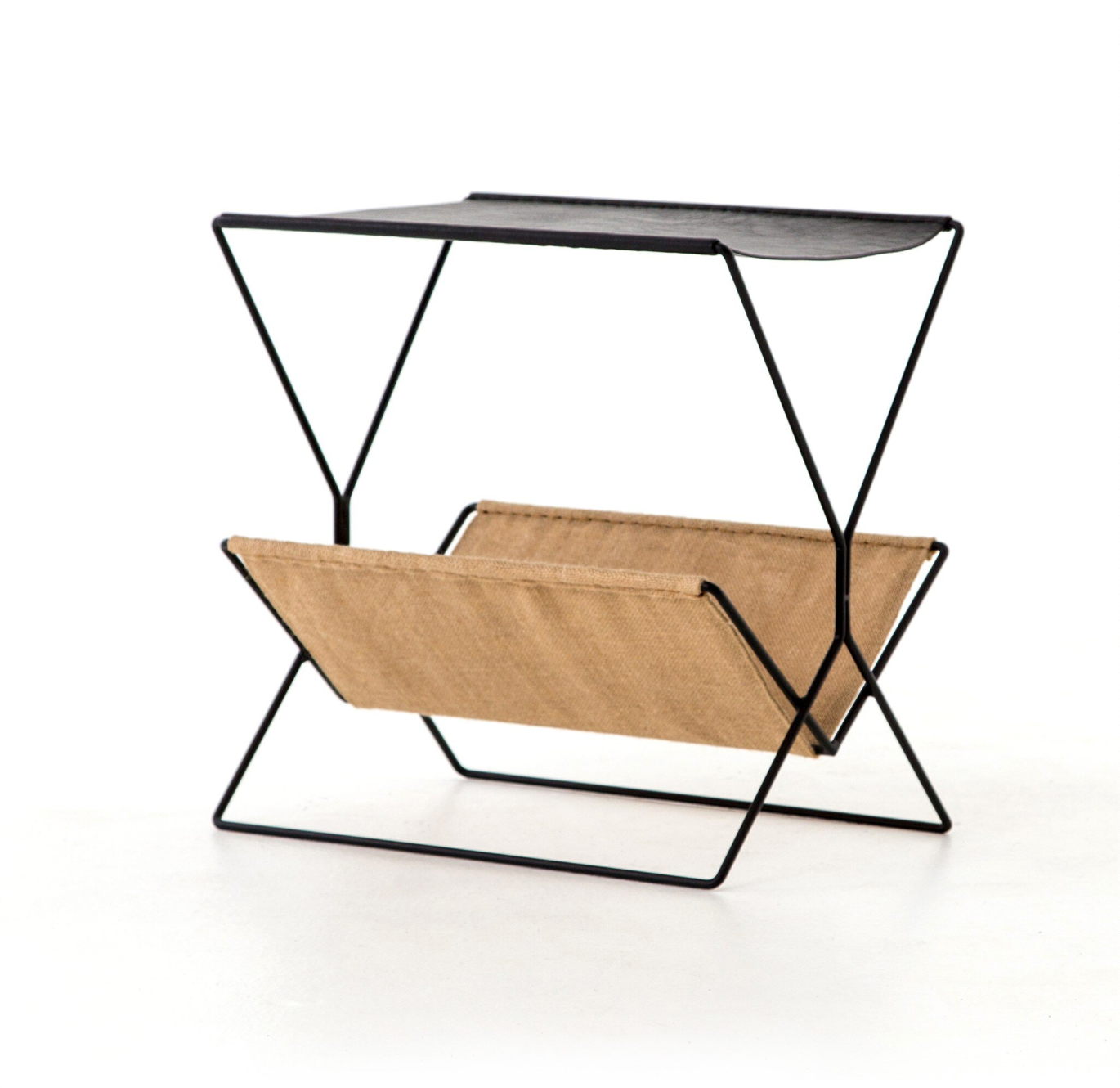 The Leather & Hemp Magazine Rack features black and brown colors, crafted from top grain leather for a sophisticated look.