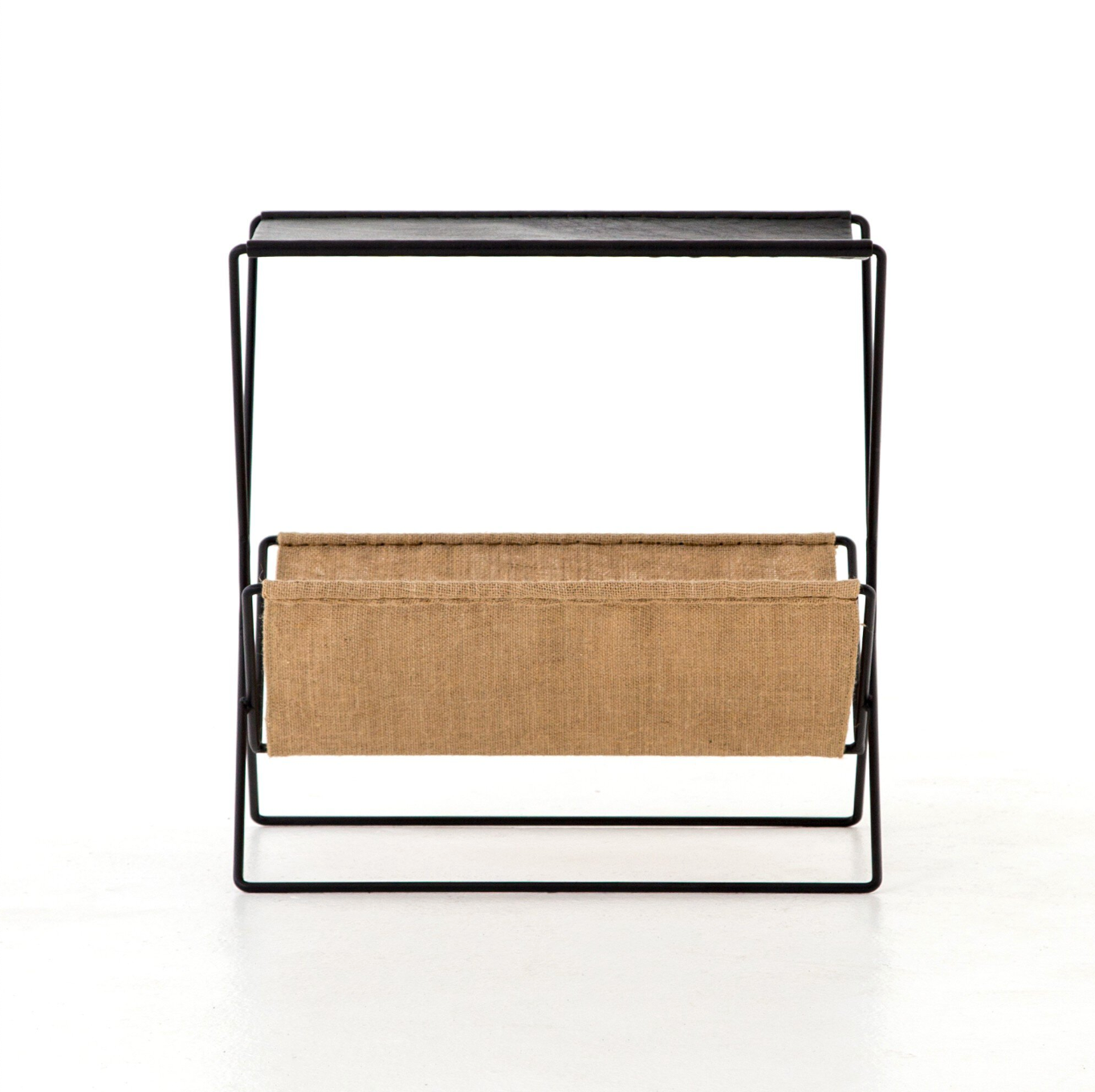 The Leather & Hemp Magazine Rack features a black metal frame and a rectangular hemp fabric sling for holding magazines, displayed against a white background.