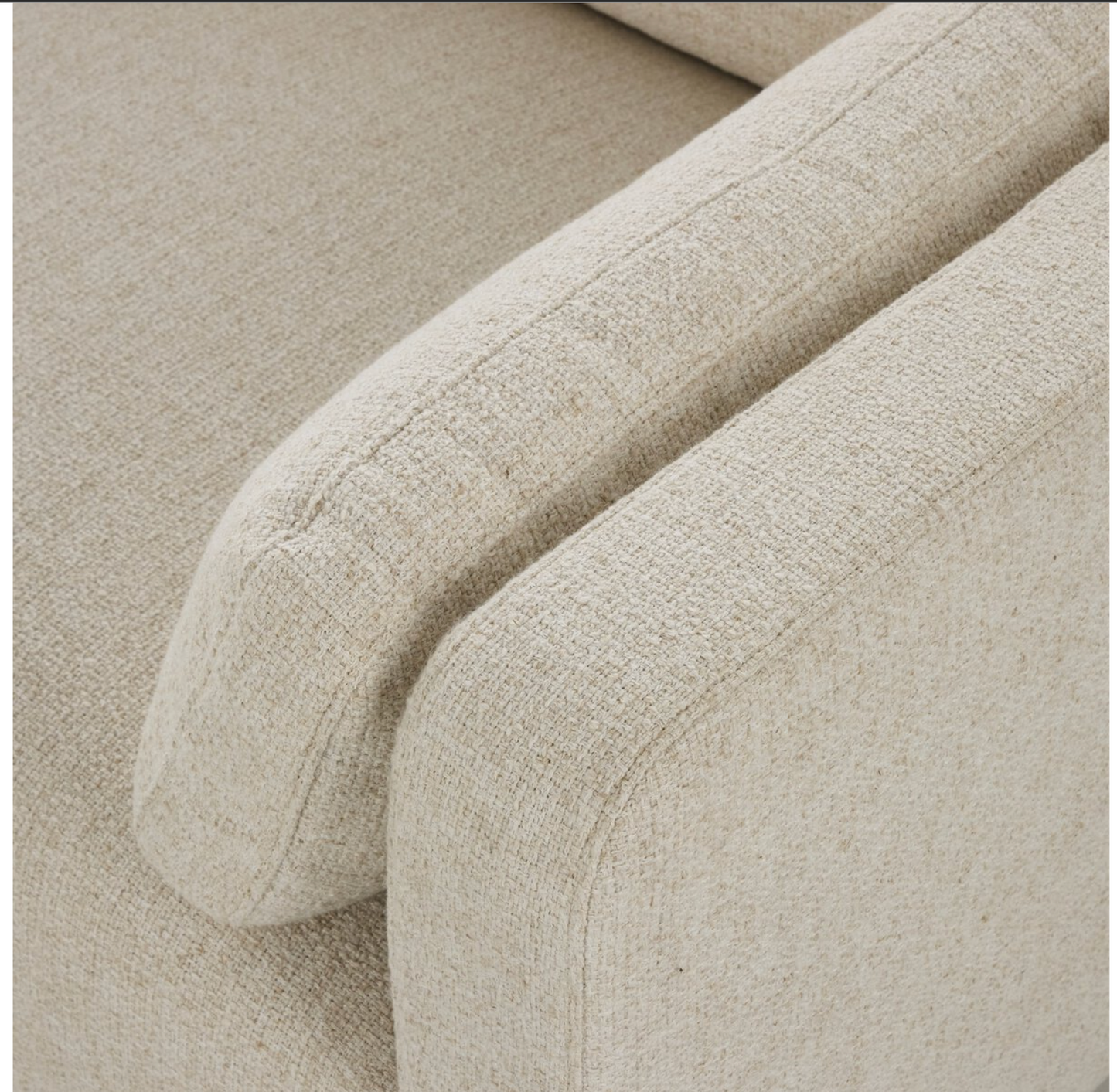 Close-up of a cream basketweave armchair's armrest and seat cushion, featuring clean, modern lines—ideal for pairing with the Modular 3-Piece Sectional or any upholstered sofa arrangement.