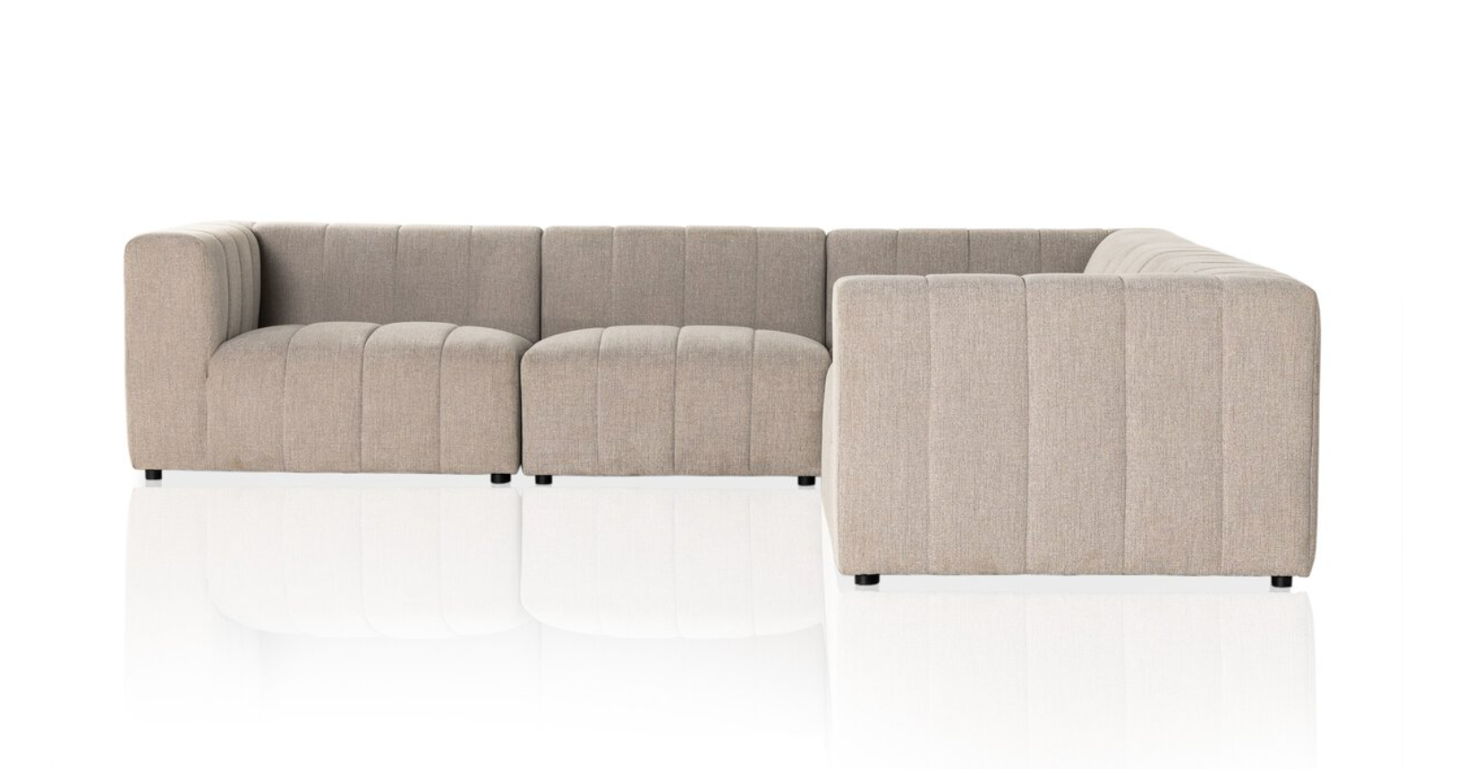 The Langham Channeled 5-Piece Sectional is a modern Italian L-shaped sectional in light grey performance fabric, featuring vertical tufted details and low black legs, displayed on a reflective white surface.