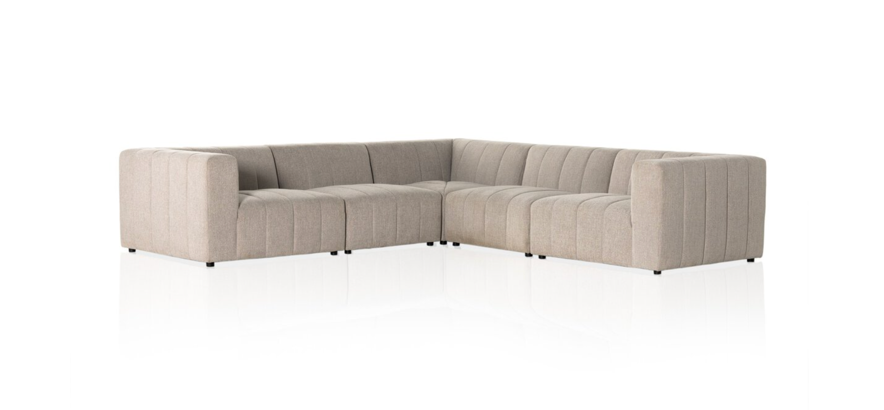 The Langham Channeled 5-Piece Sectional features deep seats, vertical tufting, and light beige performance fabric, arranged in a modern L-shape against a crisp white background.