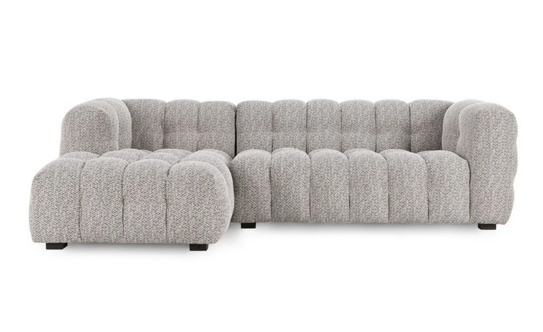 The Plush Upholstered Sectional w/LAF Chaise features a modern heathered gray look, tufted pillowy cushions, rounded edges, and short black legs.