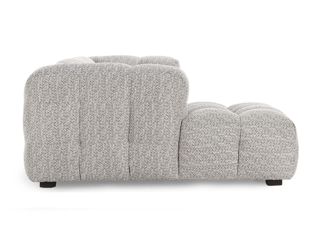 Side view of the Plush Upholstered Sectional w/LAF Chaise in heathered gray, featuring tufted, rounded design with low black legs, shown against a white background.