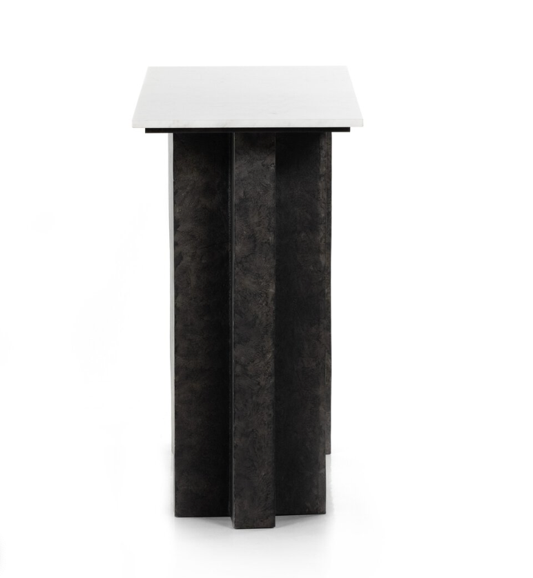 The Marble Raw Black Console Table features a black and white rectangular tabletop with sturdy cast aluminum legs.