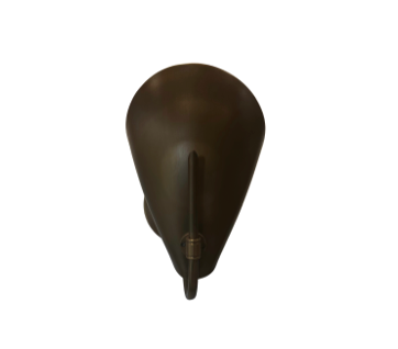 The Shell Brass Sconce features a bronze-colored, abstract design that resembles an animal head with a central vertical ridge, shown from the front against a white background.