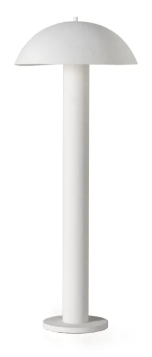 The Plaster Floor Lamp is a modern, minimalist white lamp featuring a cylindrical base and a mushroom-shaped dome shade, displayed against a plain white background.
