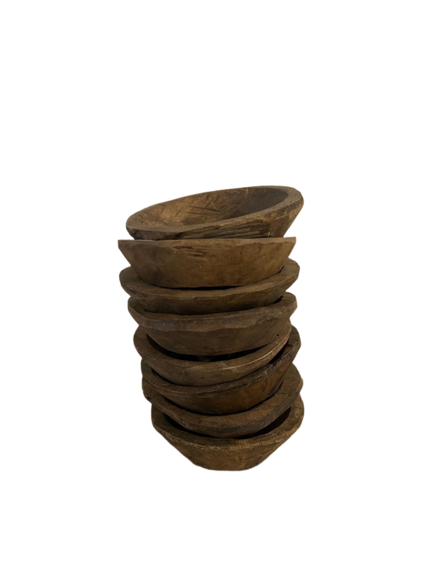 A stack of seven Small Wood Key Bowls with a rustic, worn texture, arranged unevenly and photographed against a plain white background.