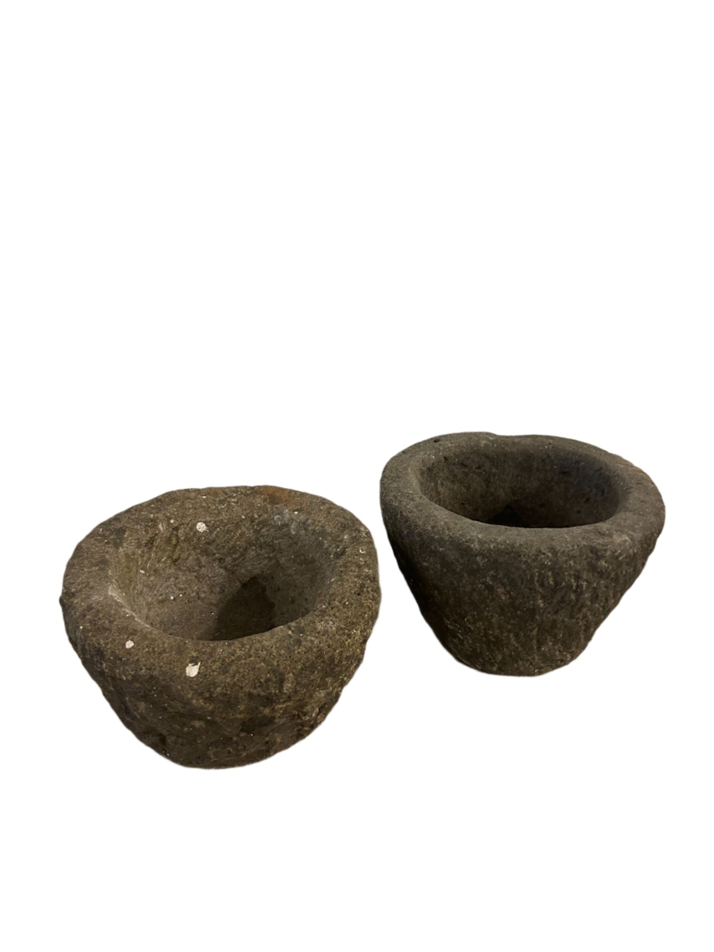 Two unique Large Antique Stone Mortars, featuring rustic, textured surfaces and round shapes (each one of a kind), are displayed side by side on a white background; overall diameter ranges from 6 to 8 inches.