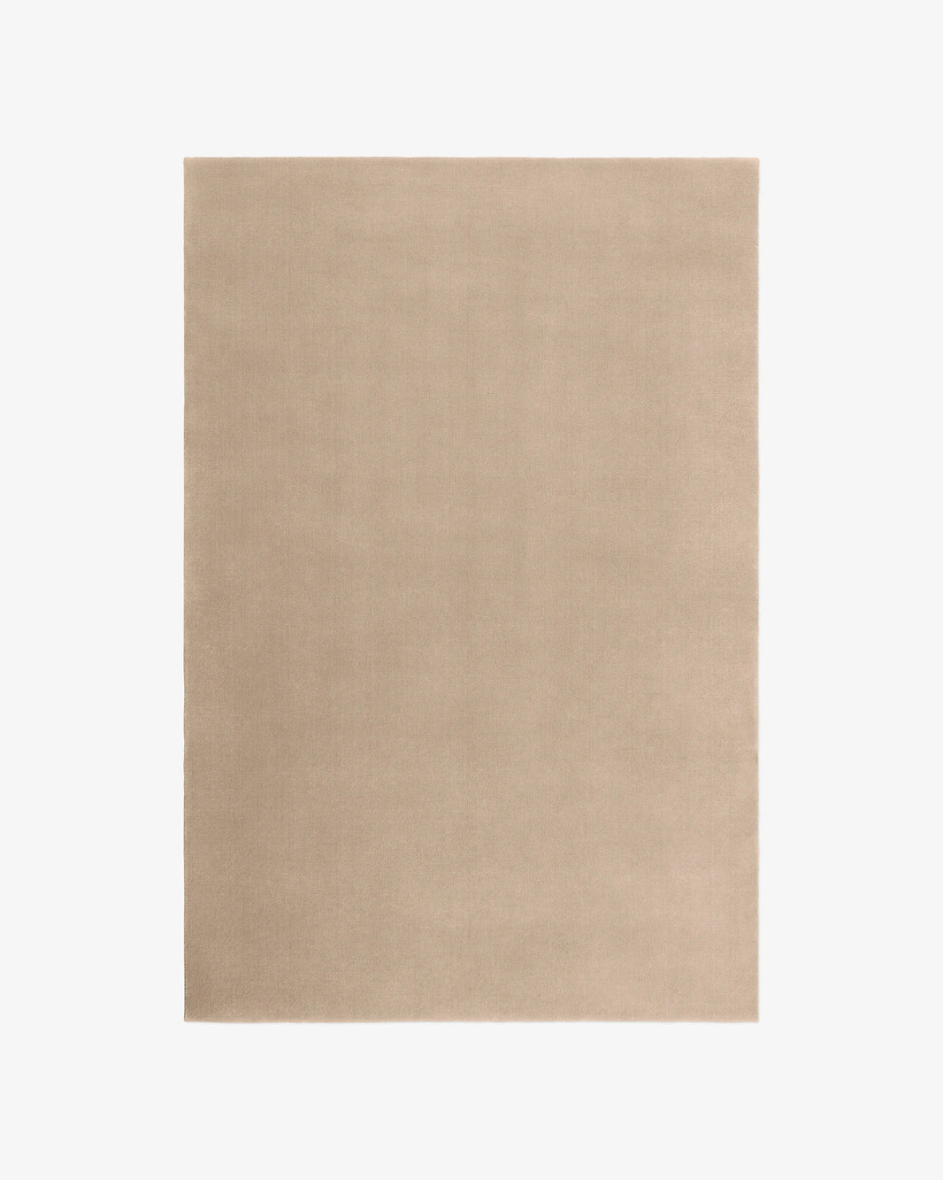 The Sand Wool Rug is a rectangular, solid beige rug with a smooth, even surface, displayed on a white background.