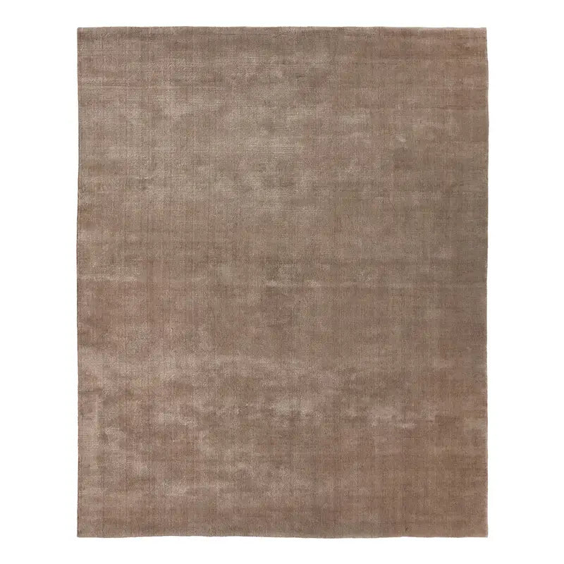 The Handwoven New Zealand Wool Rug is a rectangular, solid light brown 8x10 rug featuring a subtle, uniform texture with no visible patterns or designs, expertly crafted from premium New Zealand wool.