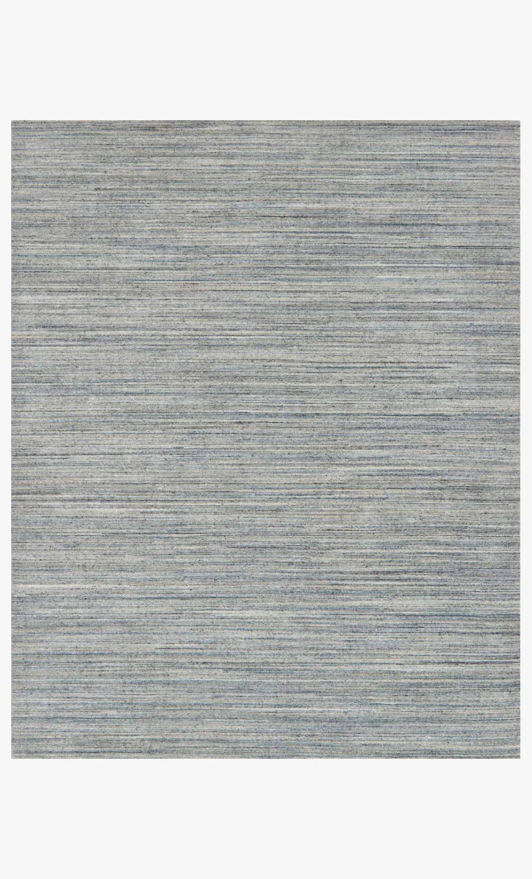 The Striated Wool Rug Collection 8'6 x11'6 is a rectangular hand-loomed rug with a subtle linear striped pattern in varying gray and blue shades, offering a textured and modern look.