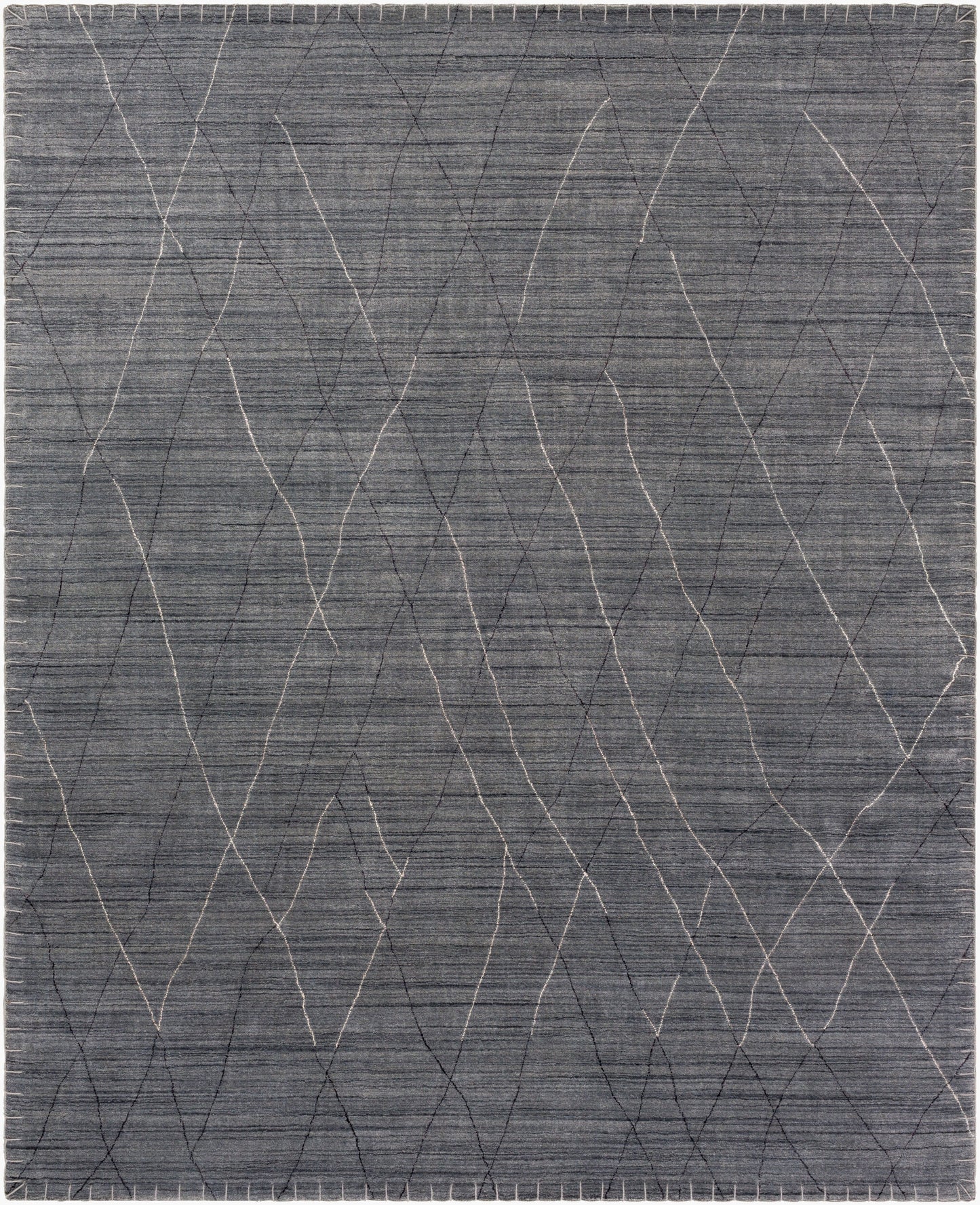 The Hand Loomed Geometric Grey Rug is a rectangular 8x10 piece in gray, featuring thin, irregular wavy white and dark lines that create an abstract, intersecting pattern across its surface.