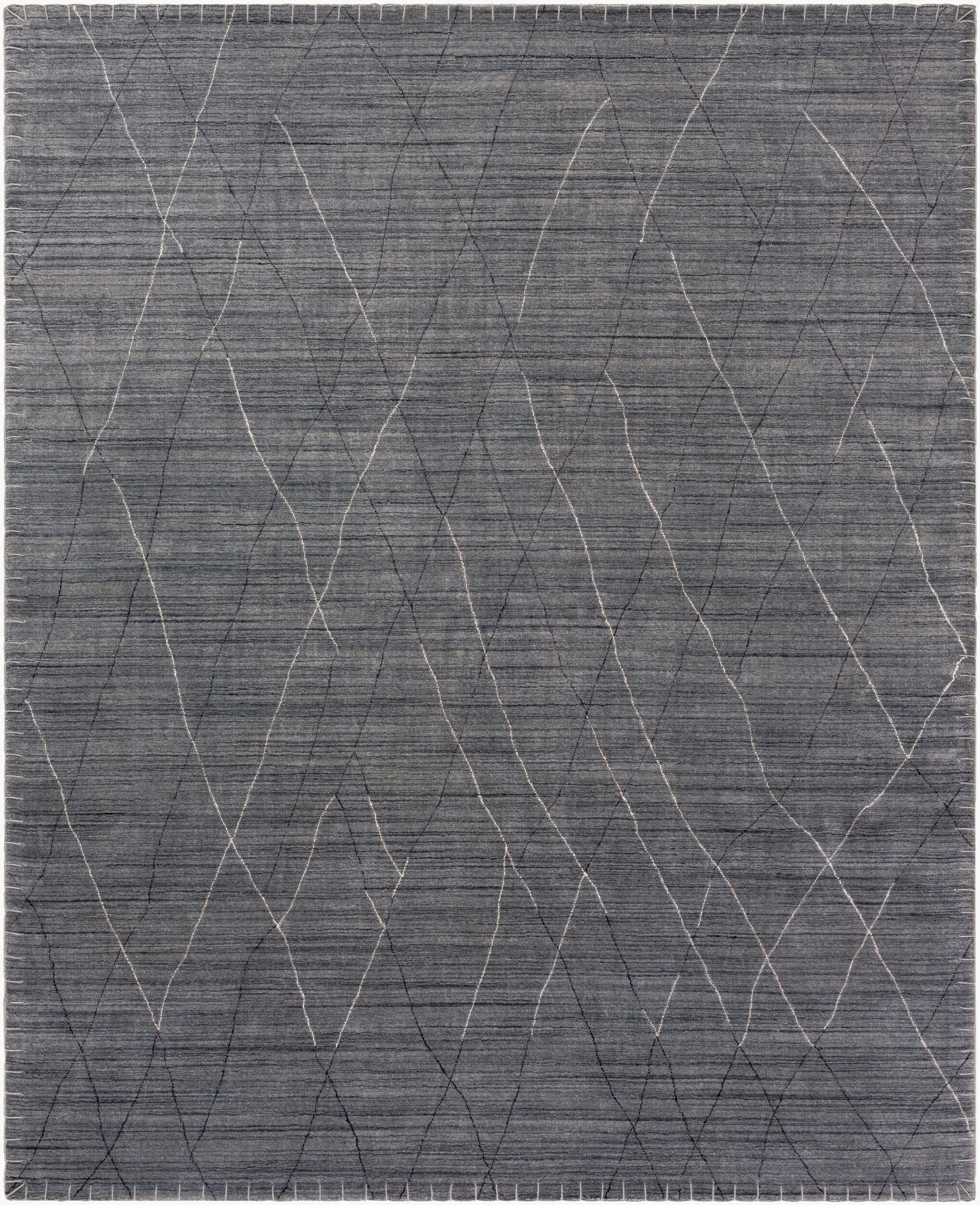 The Hand Loomed Geometric Grey Rug is a rectangular 8x10 piece in gray, featuring thin, irregular wavy white and dark lines that create an abstract, intersecting pattern across its surface.