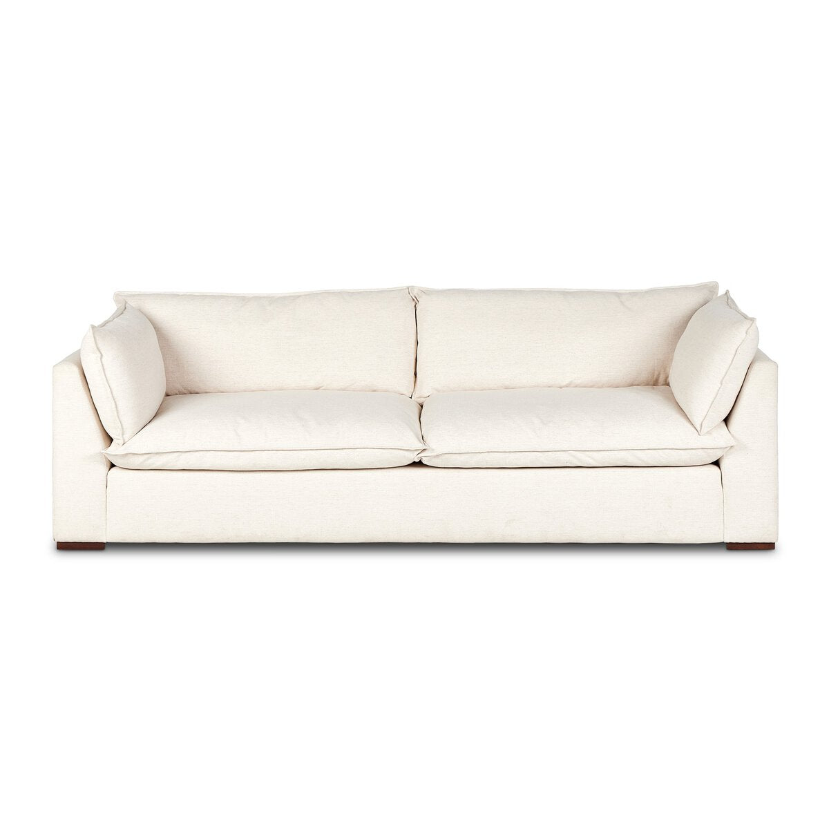 The "Sunken" Sofa is a modern, cream-colored fabric sofa featuring feather-blend cushioning, two seat and back cushions, and wide armrests, shown from the front against a white background.