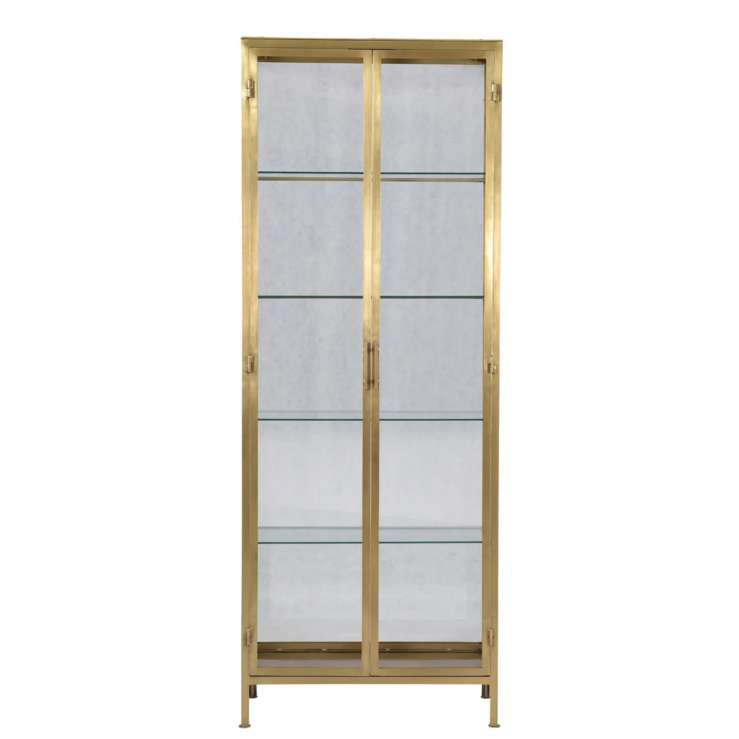 The Brass Tall Display Cabinet features glass doors, four glass shelves, and slender legs, serving as a stylish storage organizer against a white background.