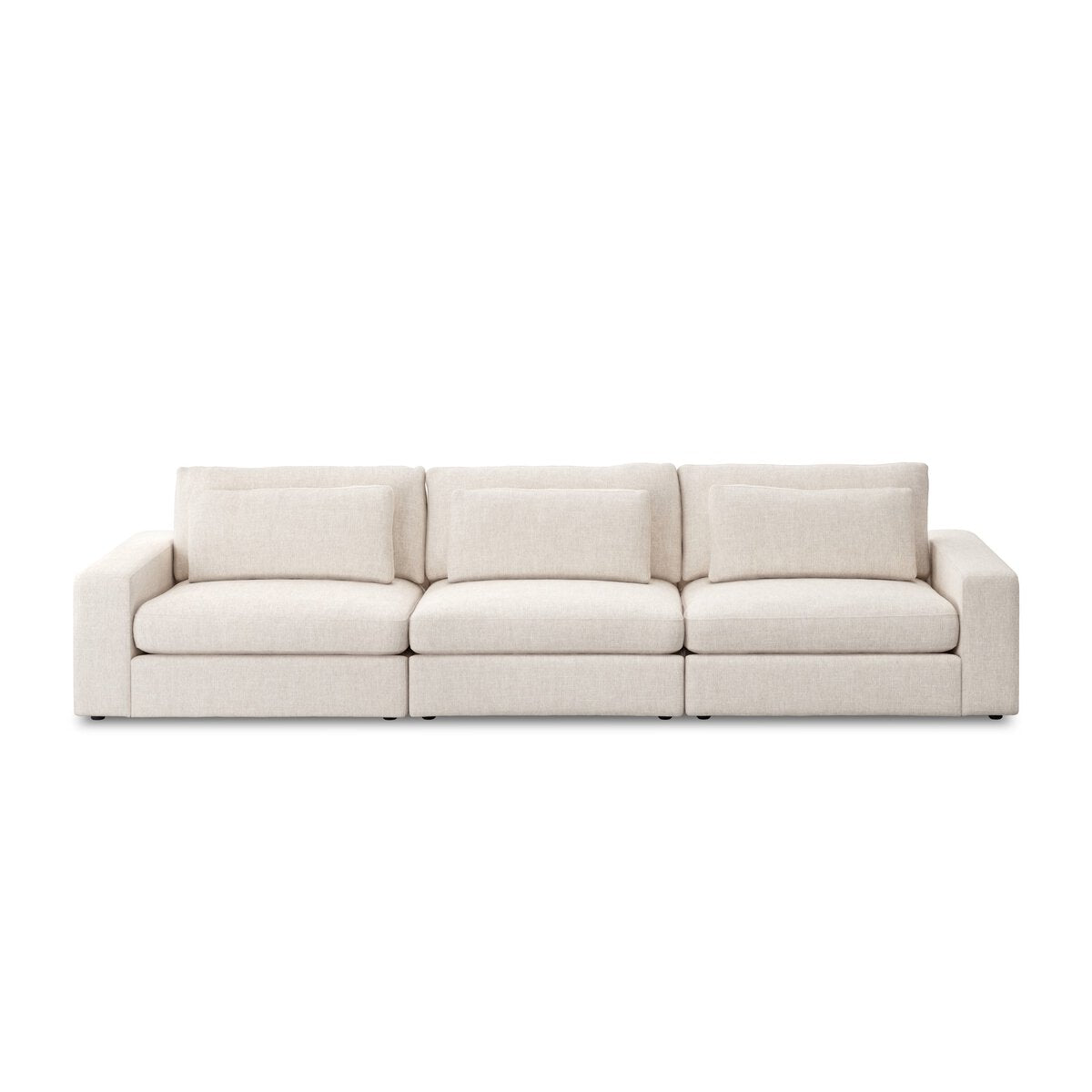 The 3-pc Modern Low Sectional is a light beige, three-seat sofa with straight arms and plush back cushions, pictured against a plain white background.