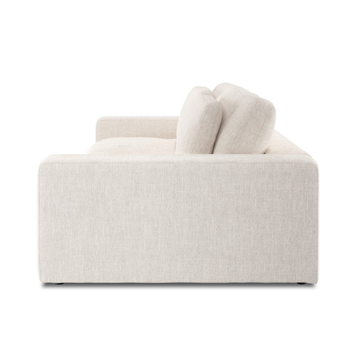 Side view of the Modern Low Loveseat, a light beige sofa with clean lines, square arms, and two back cushions against a white background—ideal for anyone needing exact sofa dimensions.
