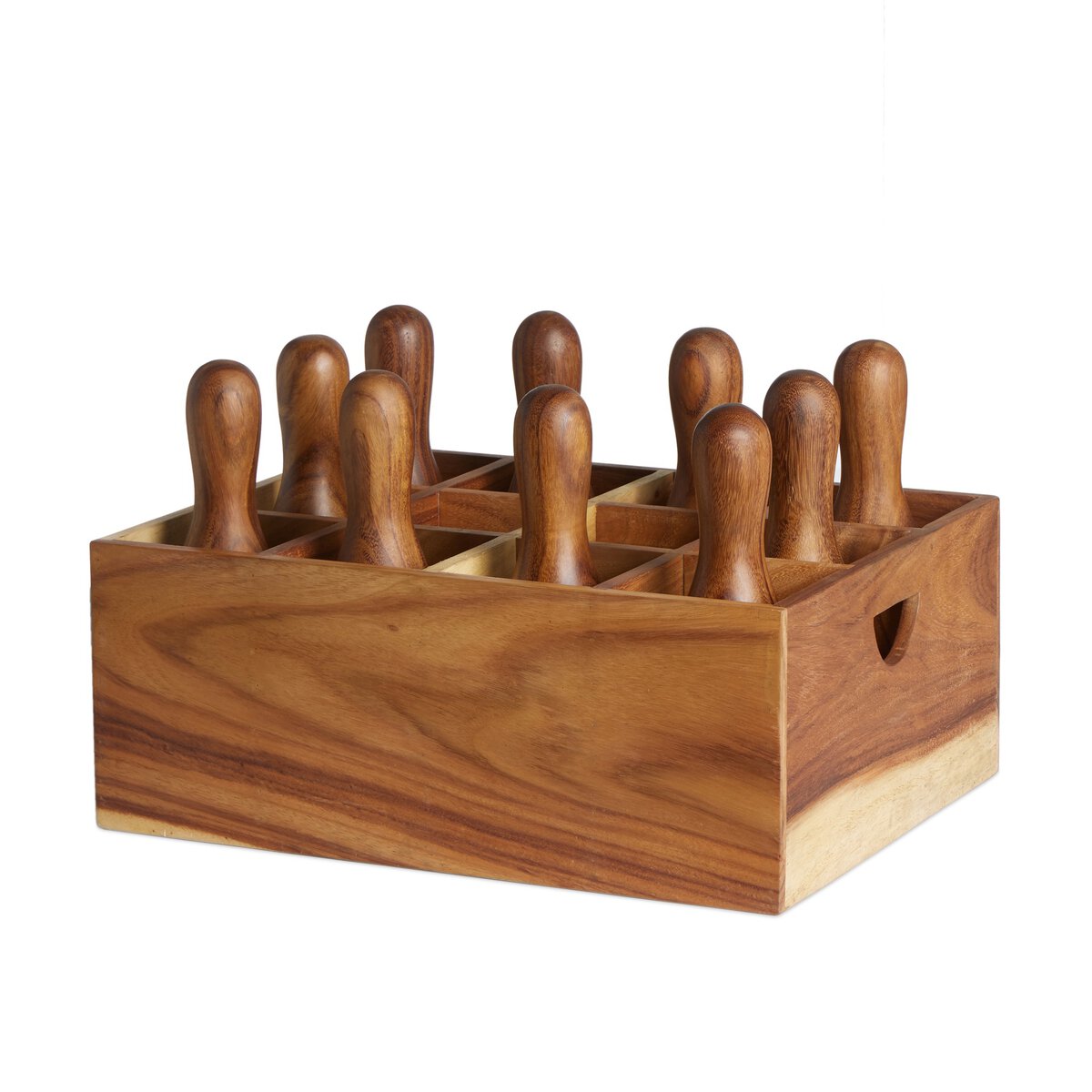 The Outdoor Bowling Set includes a wooden box with compartments holding ten solid wood pins, each shaped like classic bowling pins with rounded handles, all made from the same type of wood.