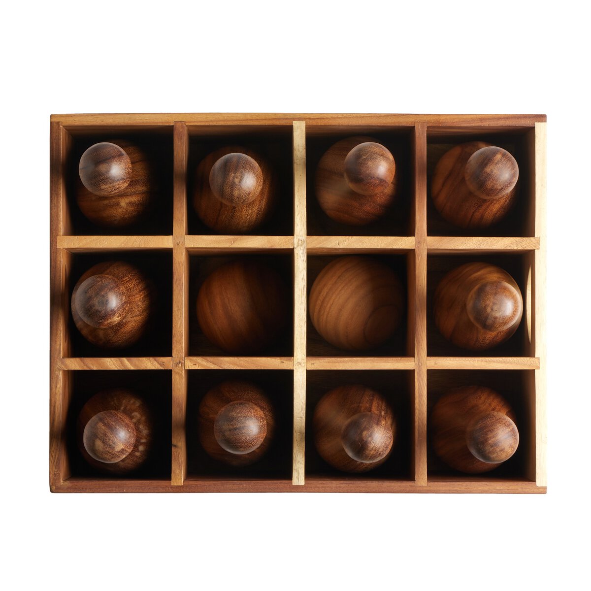 The Outdoor Bowling Set features a wooden box with a 4x3 grid of compartments, each holding a smooth, round solid wood ball resembling a mini pin or knob, shown from above on a white background.