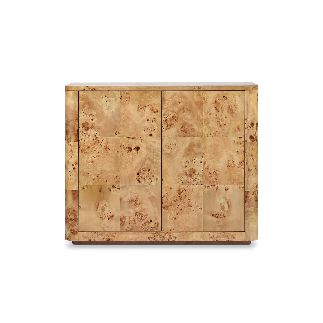 The Mappa Burl Cabinet is a small, modern piece crafted from unique wood, featuring a smooth light brown burl finish with natural swirling patterns and two doors.