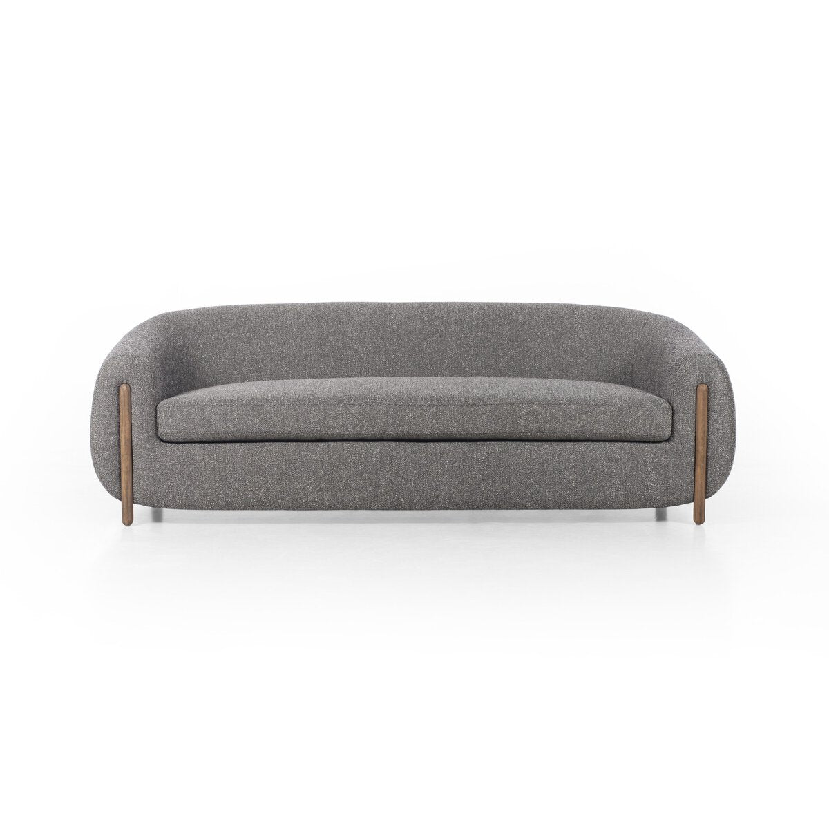 The Tub Loveseat is a modern, minimalist gray fabric sofa with deep seating, rounded edges, and wooden cylindrical legs, shown against a plain white background.