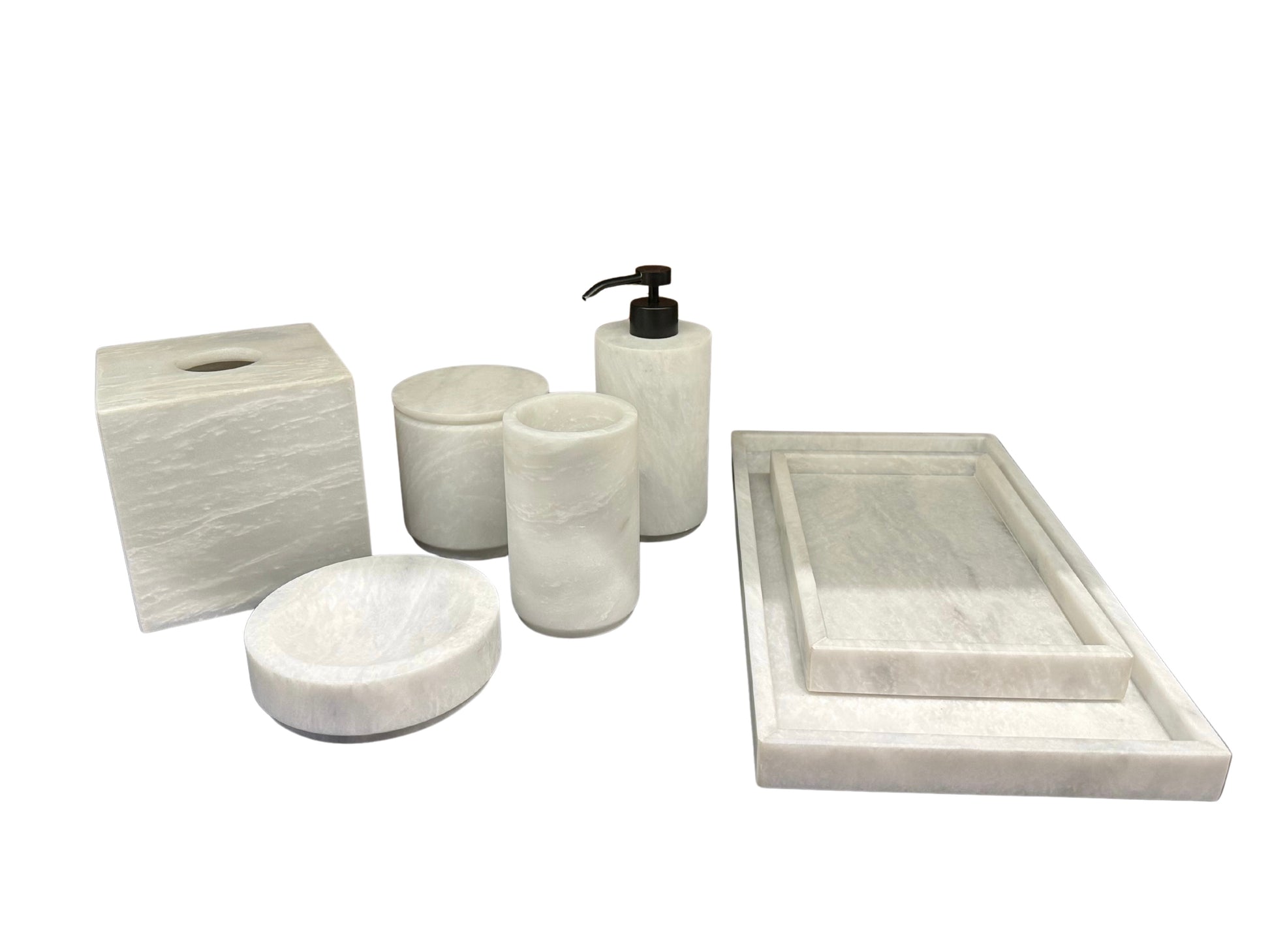 The Bathroom Set - Pearl White includes a tissue box cover, soap dish, two jars, a lotion dispenser, and two trays, all crafted in white marble and displayed on a white background.