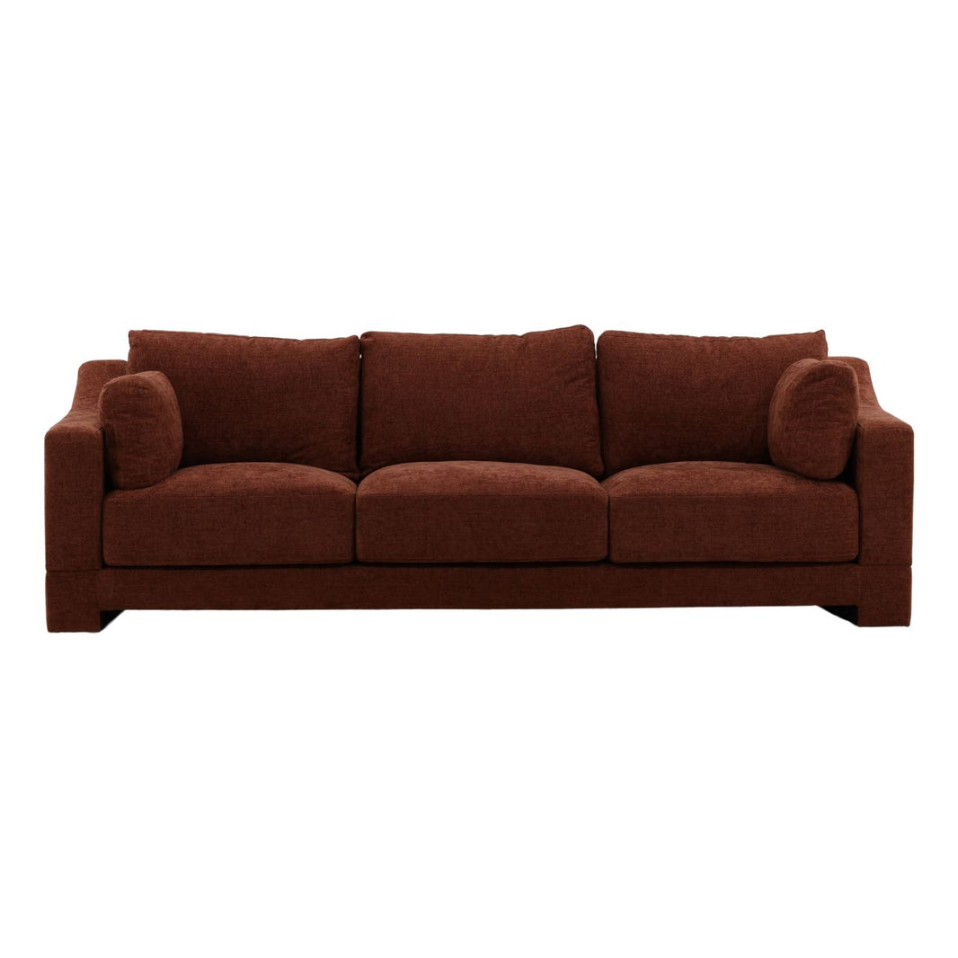 Introducing the Rust Tweed Sofa—a modern three-seater upholstered in rich dark brown fabric. It features straight arms, plush seat and back cushions, and two round side pillows. Thoughtfully designed dimensions and generous seat depth offer exceptional comfort and ample space for relaxation.
