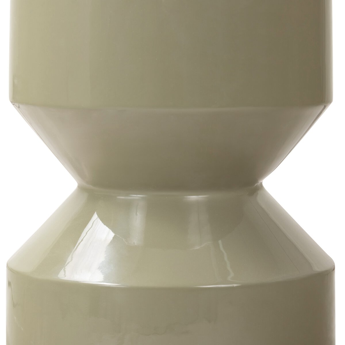 Close-up of a glossy, light olive green Moss Laquered Concrete Outdoor End Table with geometric, angular contours and a symmetrical hourglass shape. Its smooth, reflective surface adds a modern touch to any outdoor space.