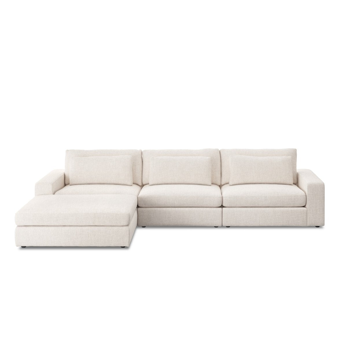 The 3-pc Modern Low Sectional is a light beige, left-facing sectional sofa with three seat and backrest cushions, clean lines, and a minimalist design—perfectly sized to fit contemporary spaces.