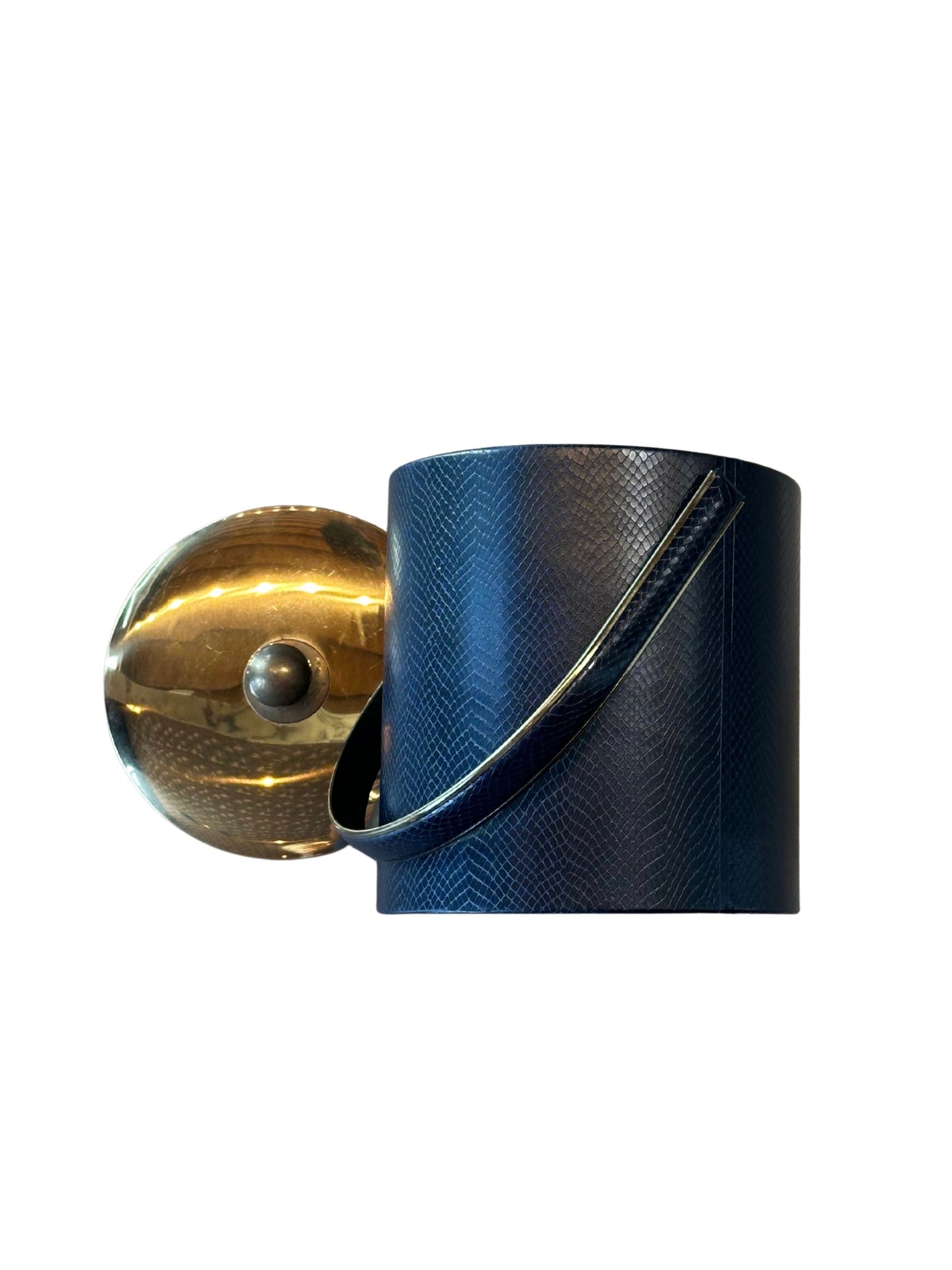 A Blue and Gold Ice Bucket with a matching handle and a shiny, round gold lid featuring a small knob, set against a plain white background.