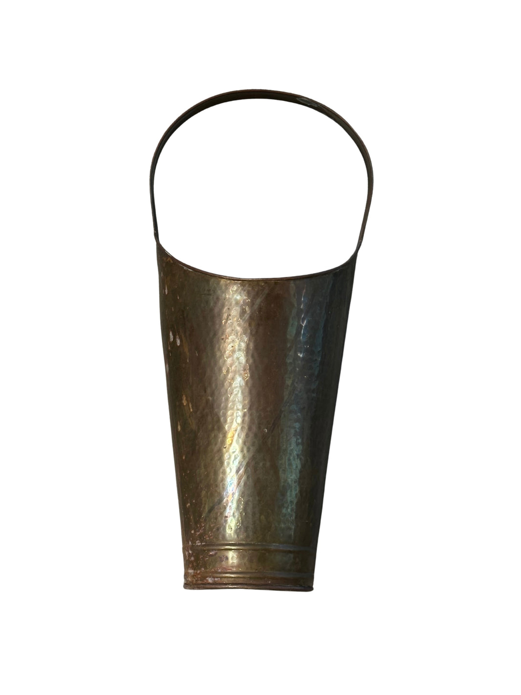 The Brass Bucket Tall is a vintage, cone-shaped metal bucket with a hammered texture and simple curved handle, shown against a white background.
