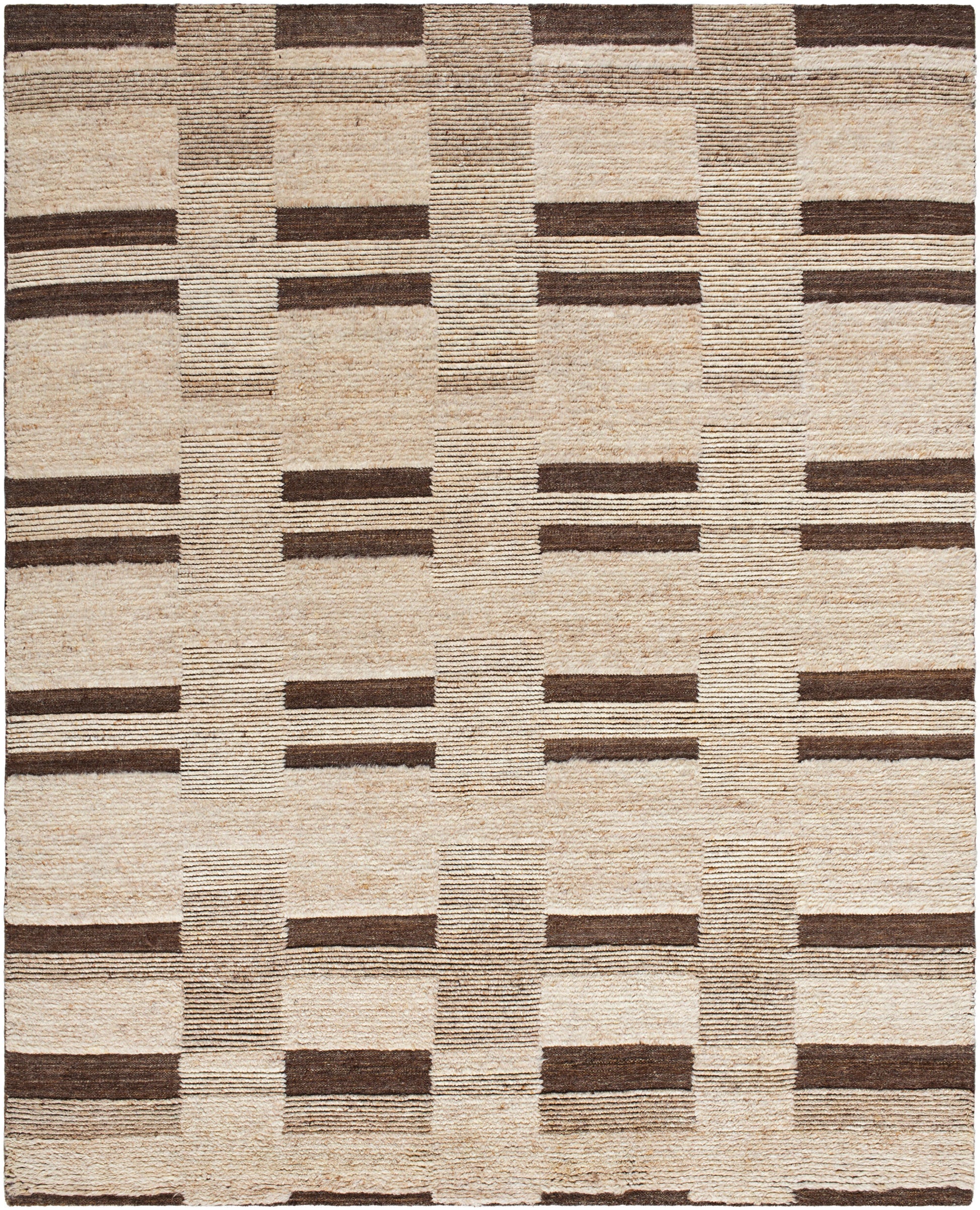 The Patched Rug 8 x 10 is a rectangular hand-knotted wool rug featuring a beige background with intersecting brown lines in a geometric plaid or grid-like pattern.