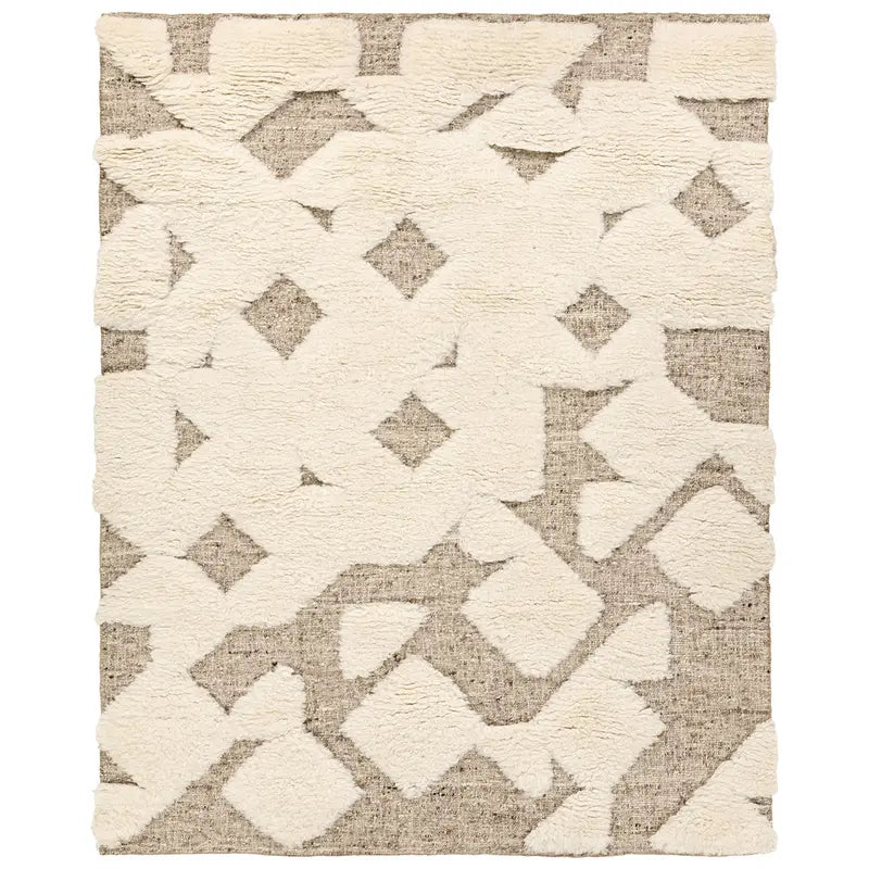 The Handwoven Hi Lo Wool Rug features a rectangular taupe design with a high-pile cream geometric pattern over a flat-woven beige background for a modern, textured look.