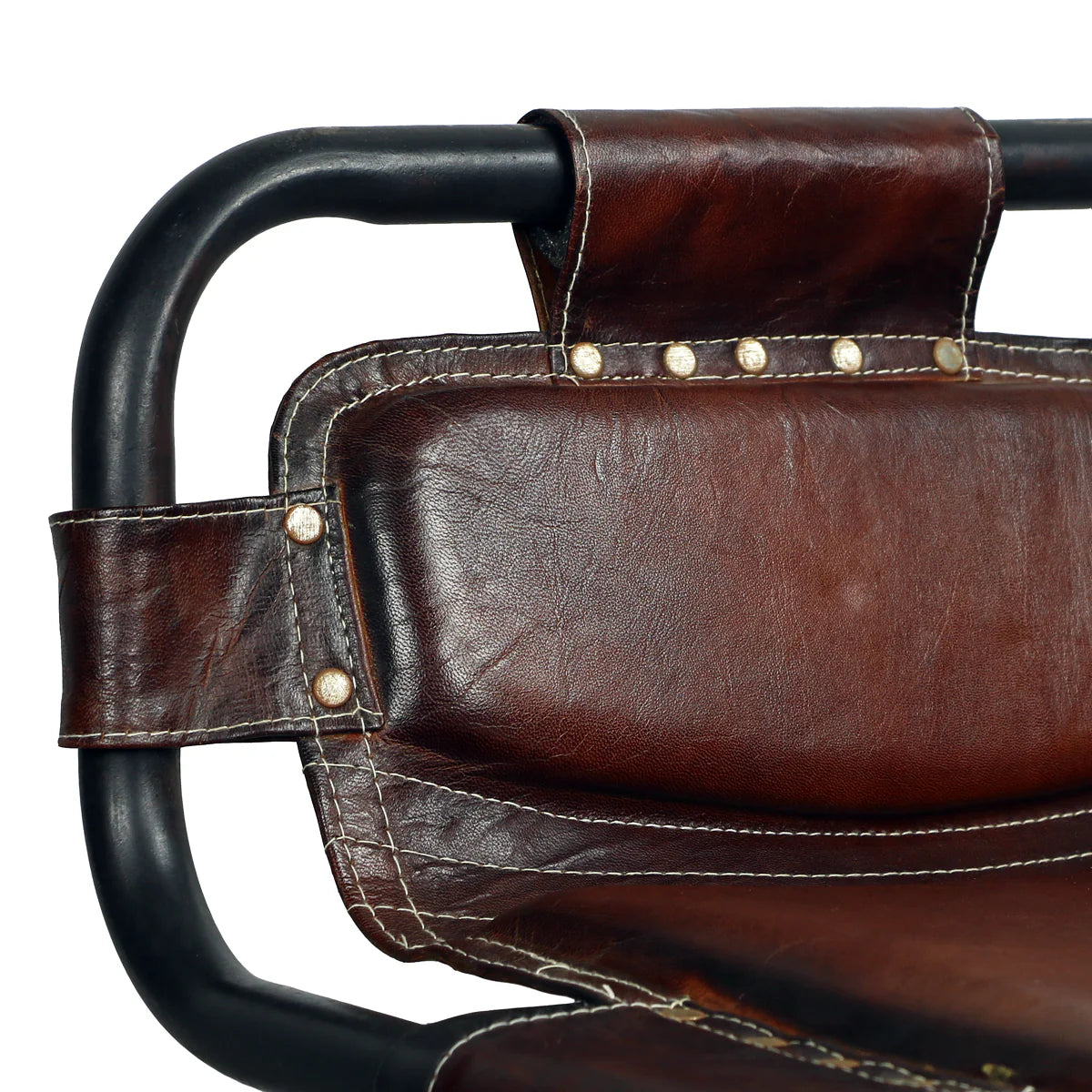 Close-up of the Stitched Leather Stool's backrest, featuring dark brown leather with visible stitching and metal rivets, attached to a sturdy black metal frame.