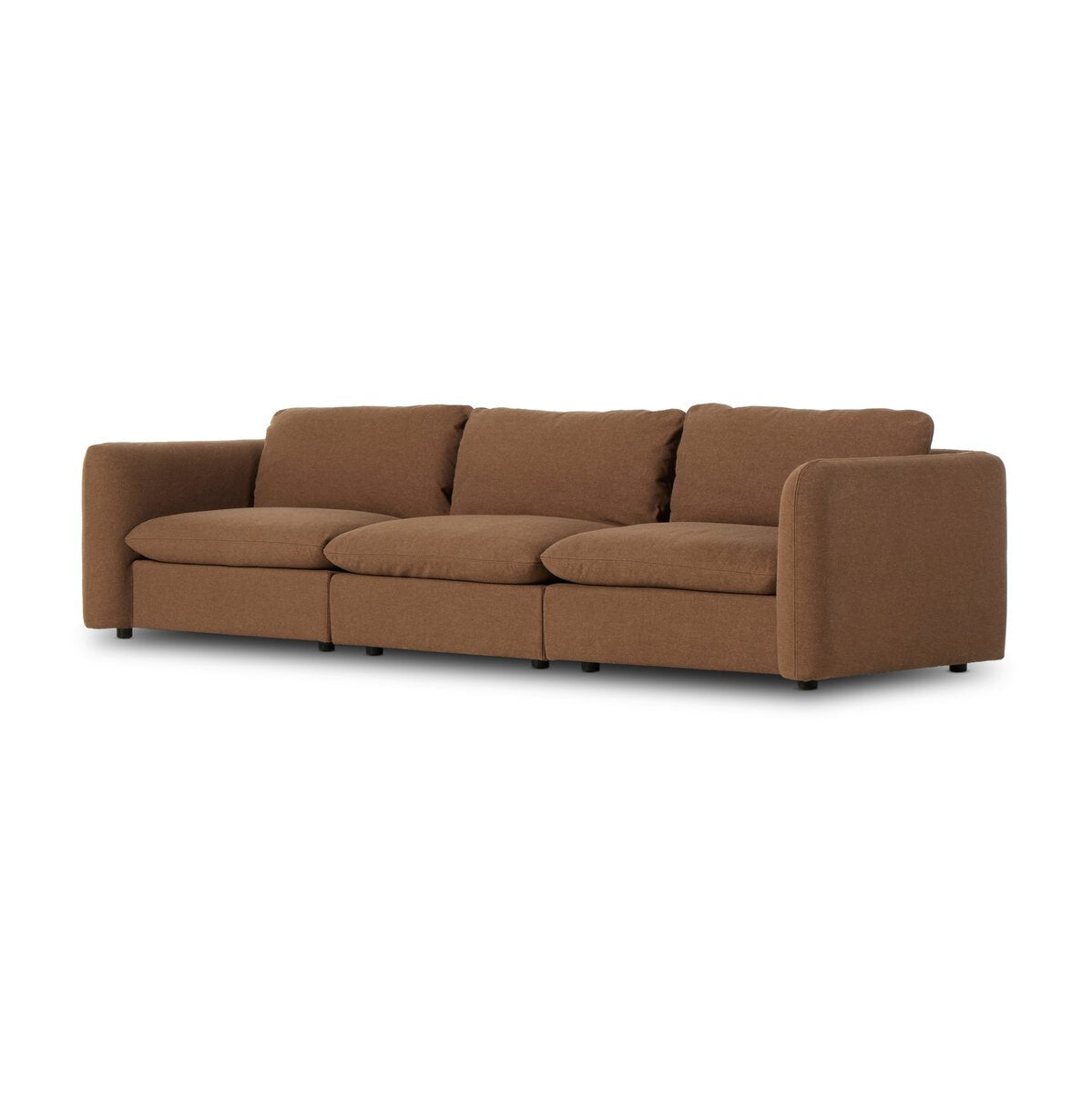 The Linen 3pc Sectional is a modern, brown fabric three-seater with wide armrests and plush cushions, offering spacious comfort and style against a plain white background.