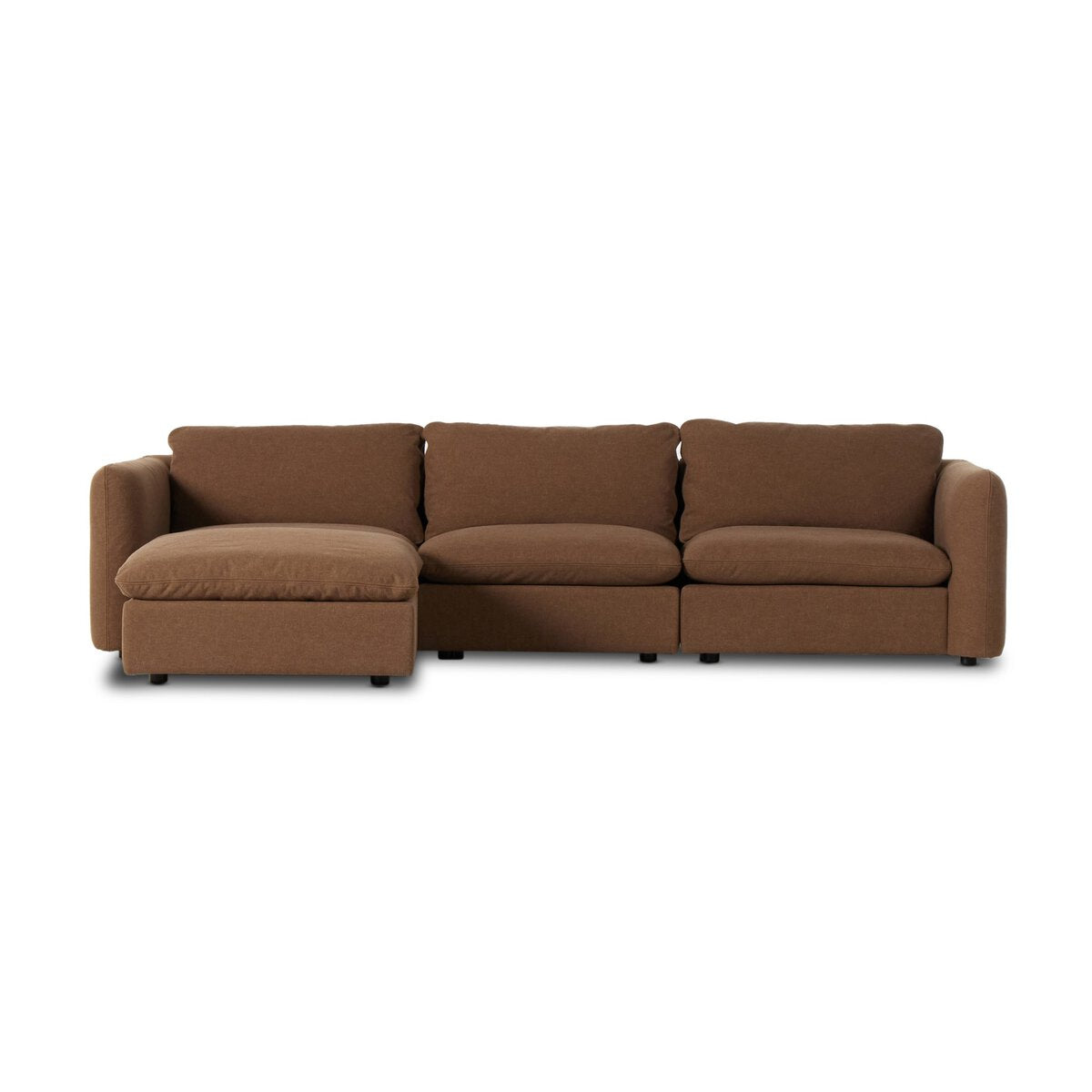 The Linen 3pc Sectional is a brown sofa with three seats and a left chaise lounge, rounded arms, plush back cushions, and an optional ottoman, shown on a plain white background.