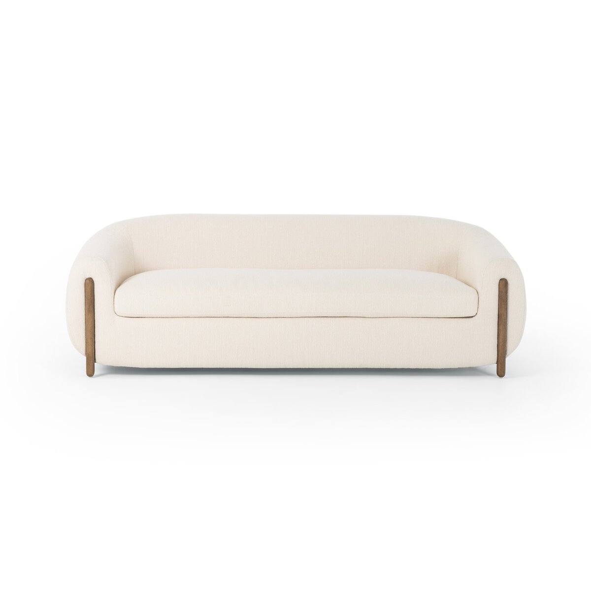 The Tub Loveseat is a modern, cream-colored sofa with deep seating, rounded edges, and wooden legs, showcased against a plain white background.