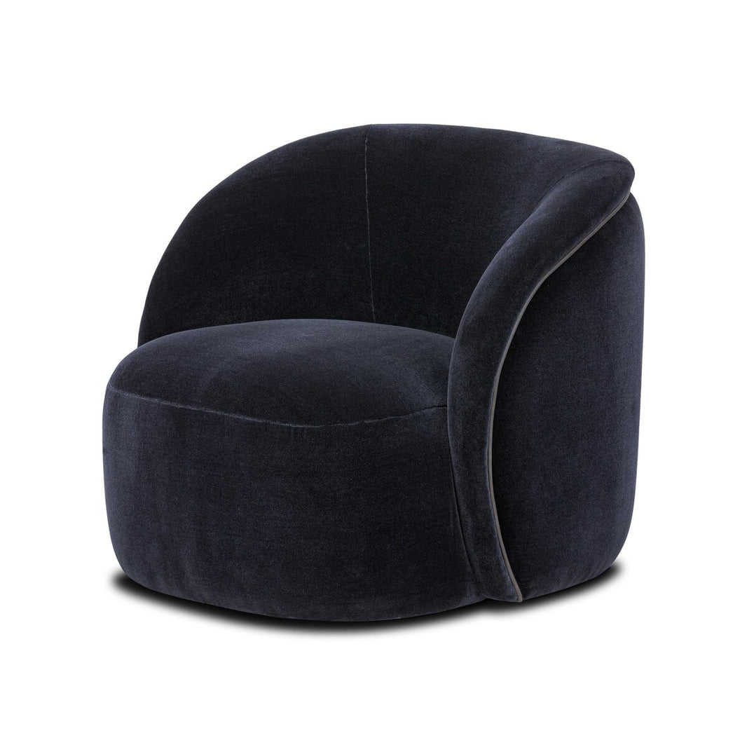 The Laurrey Swivel Chair features a modern, low-profile design with dark navy velvet upholstery, a rounded seat and back, and overall dimensions of 32.00"w x 32.50"d x 27.50"h. Its curved form sits on a flat base, pictured against a white background.