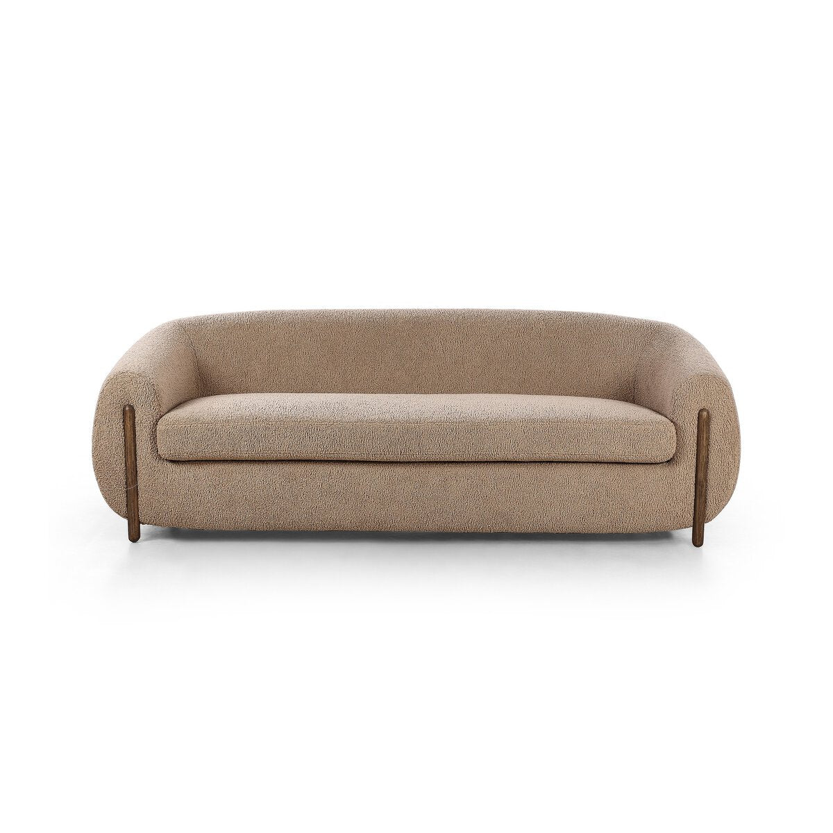 The Tub Loveseat is a modern beige sofa with rounded arms and backrest, deep seating, a plush cushion, and wooden legs, displayed against a white background.